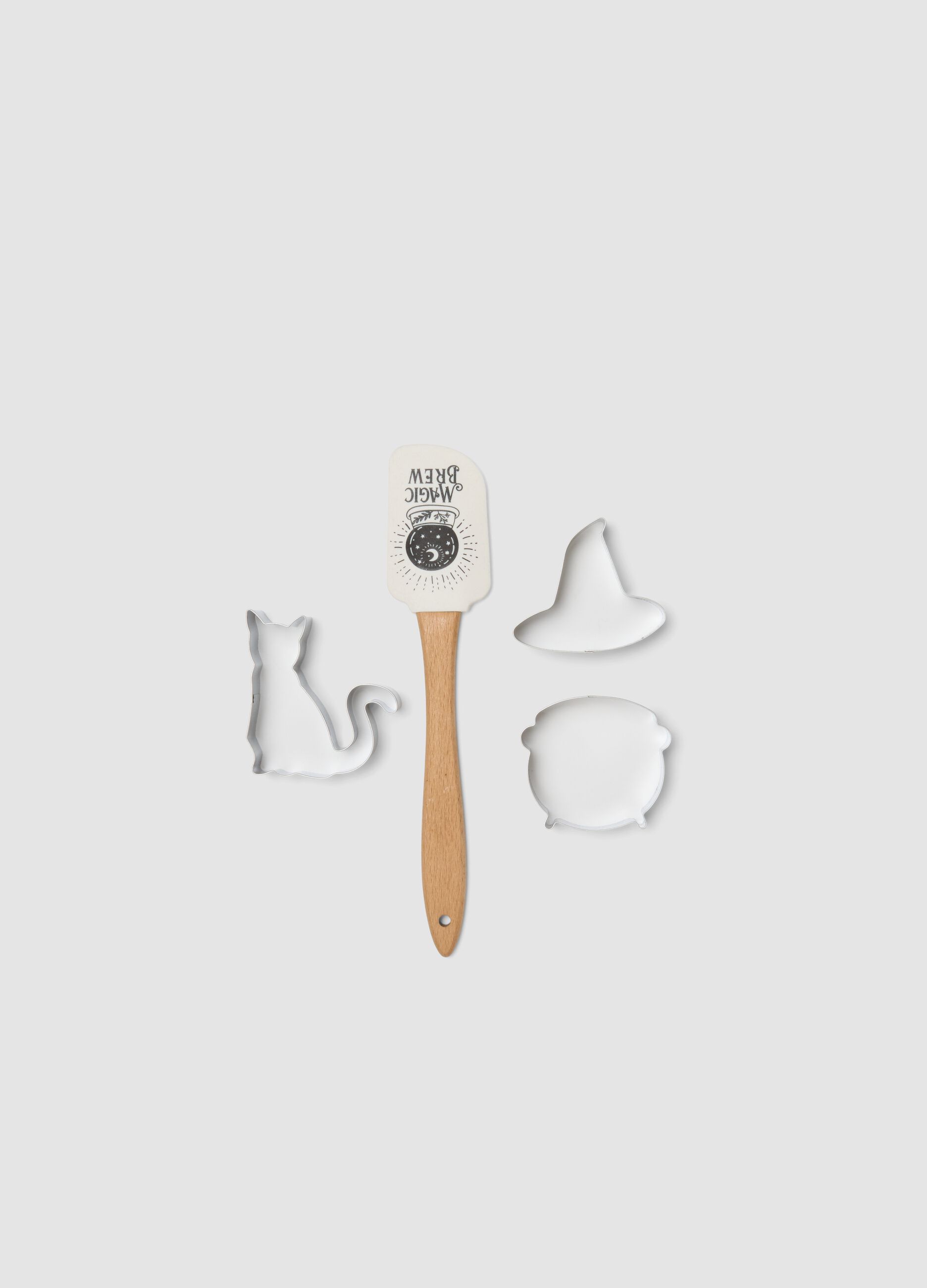White kitchen set with spatula and cutters