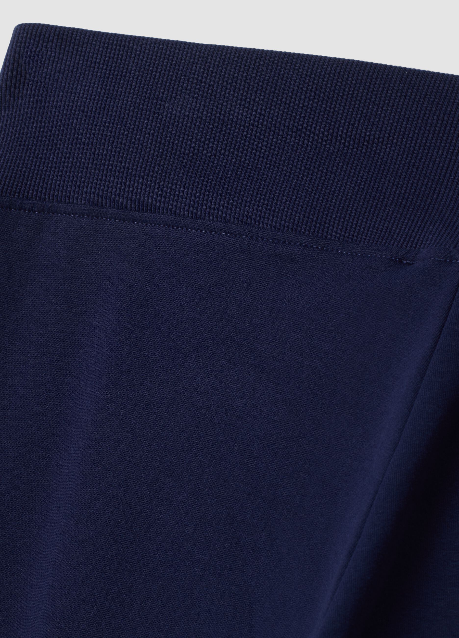 Blue bootcut trousers in stretch cotton