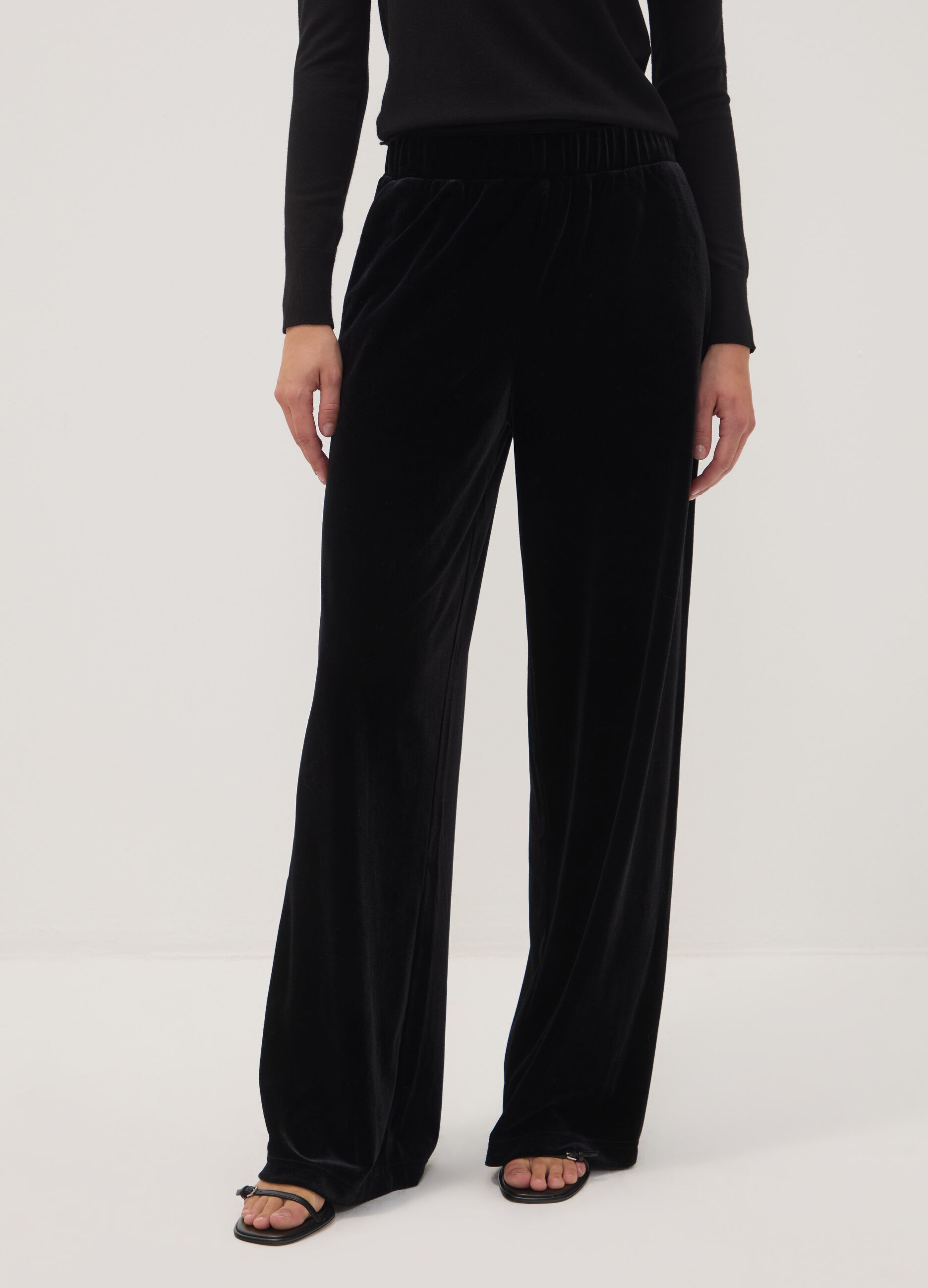 Pantaloni neri wide leg in tessuto velour elasticizzato