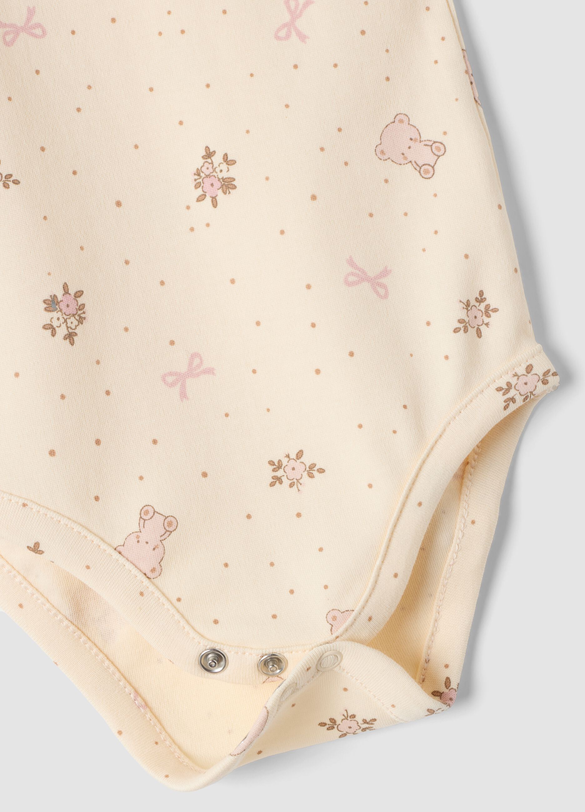 Tripack body rosa e beige in puro cotone organico con fantasia