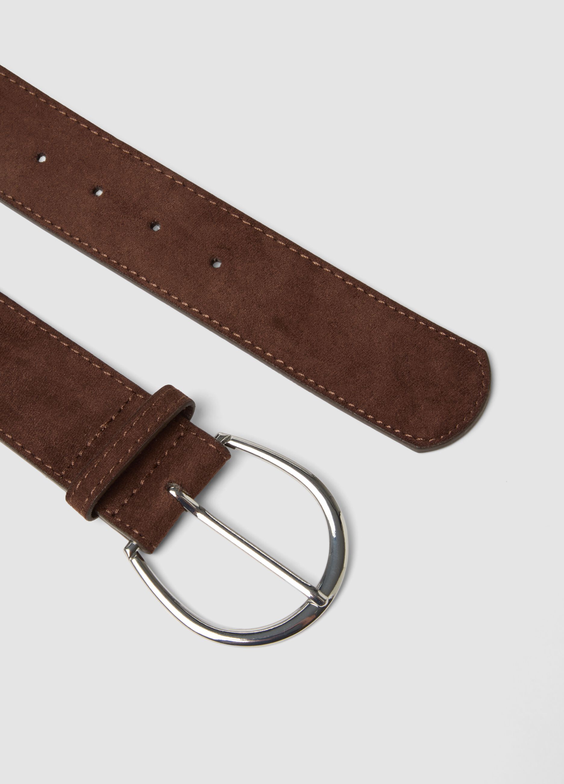 Brown belt with oval metal buckle