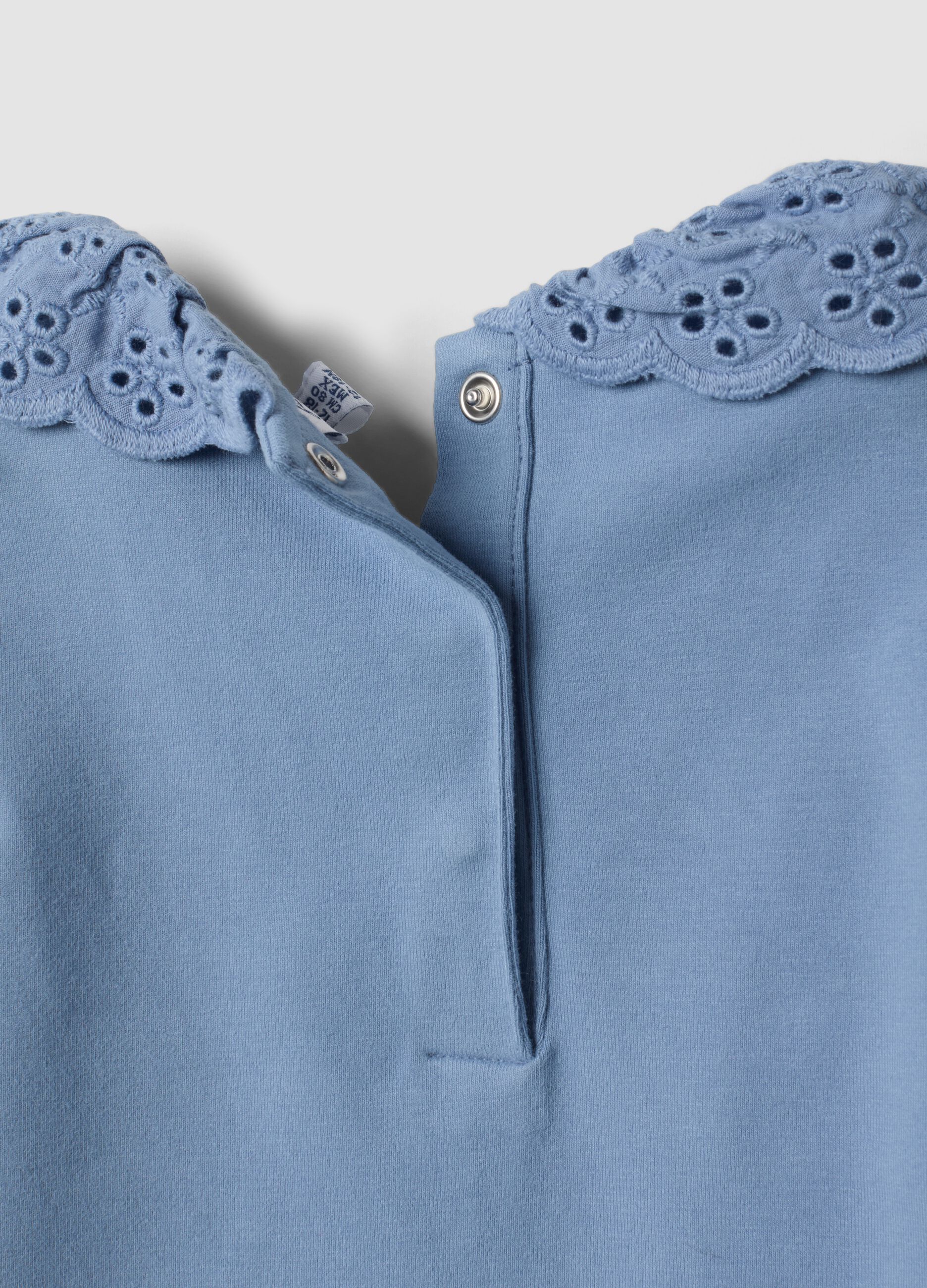 Blue stretch organic cotton top with broderie anglaise collar