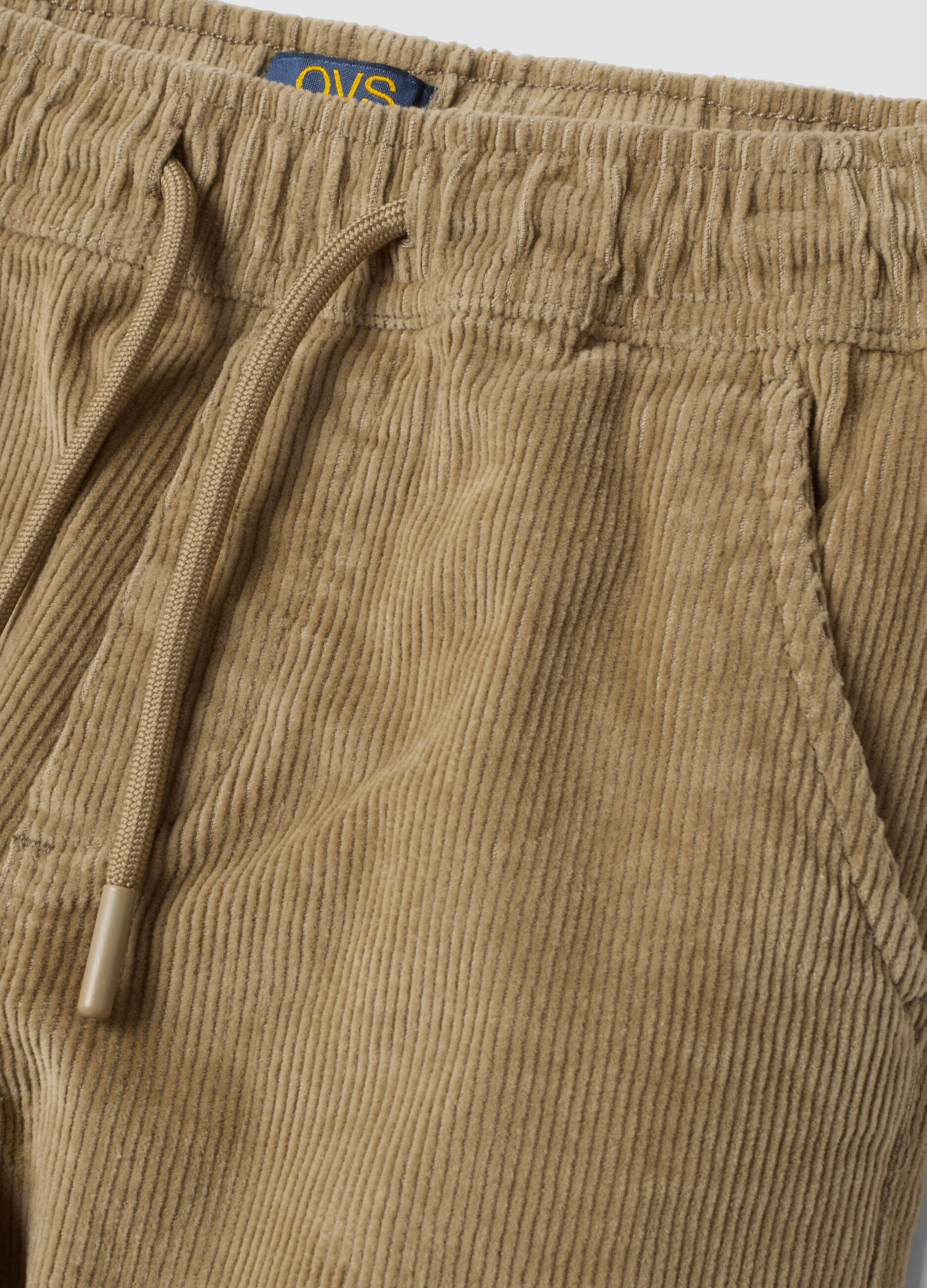 Pantaloni beige in cotone elasticizzato a coste
