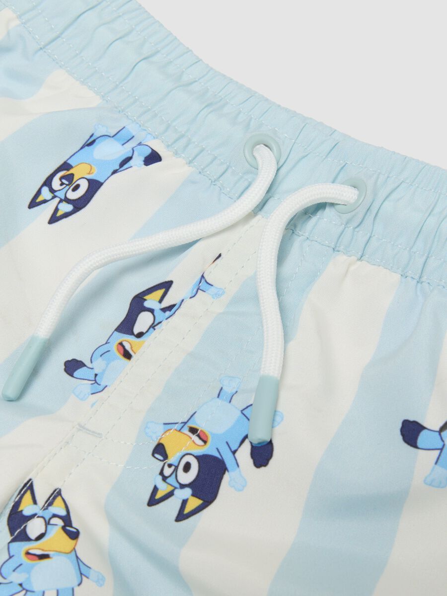 Light blue striped Bluey print swim shorts for boys_2