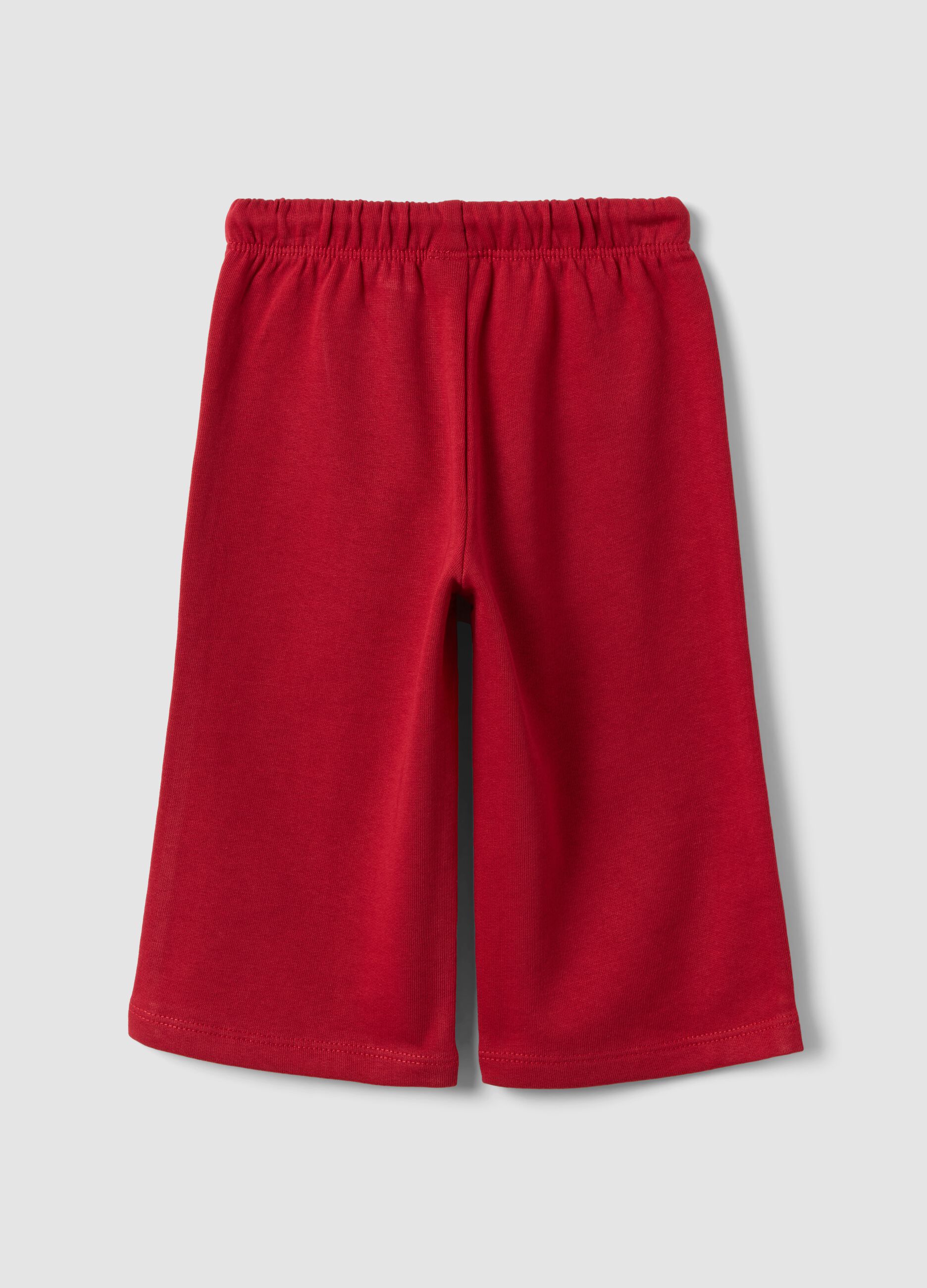 Red pure cotton trousers with elasticated waist and print for baby girls