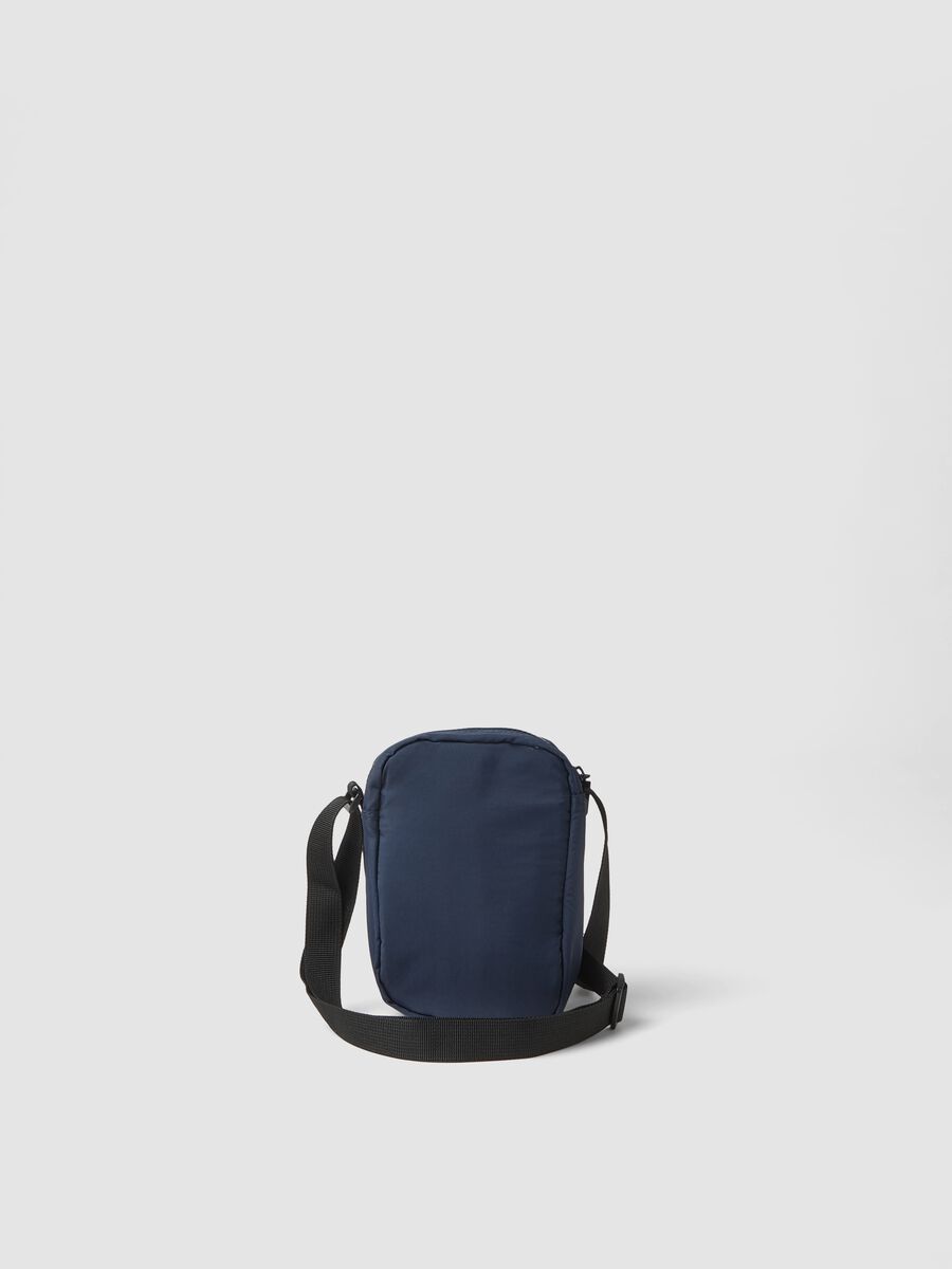 Blue crossbody bag with zip fastening and adjustable strap_1