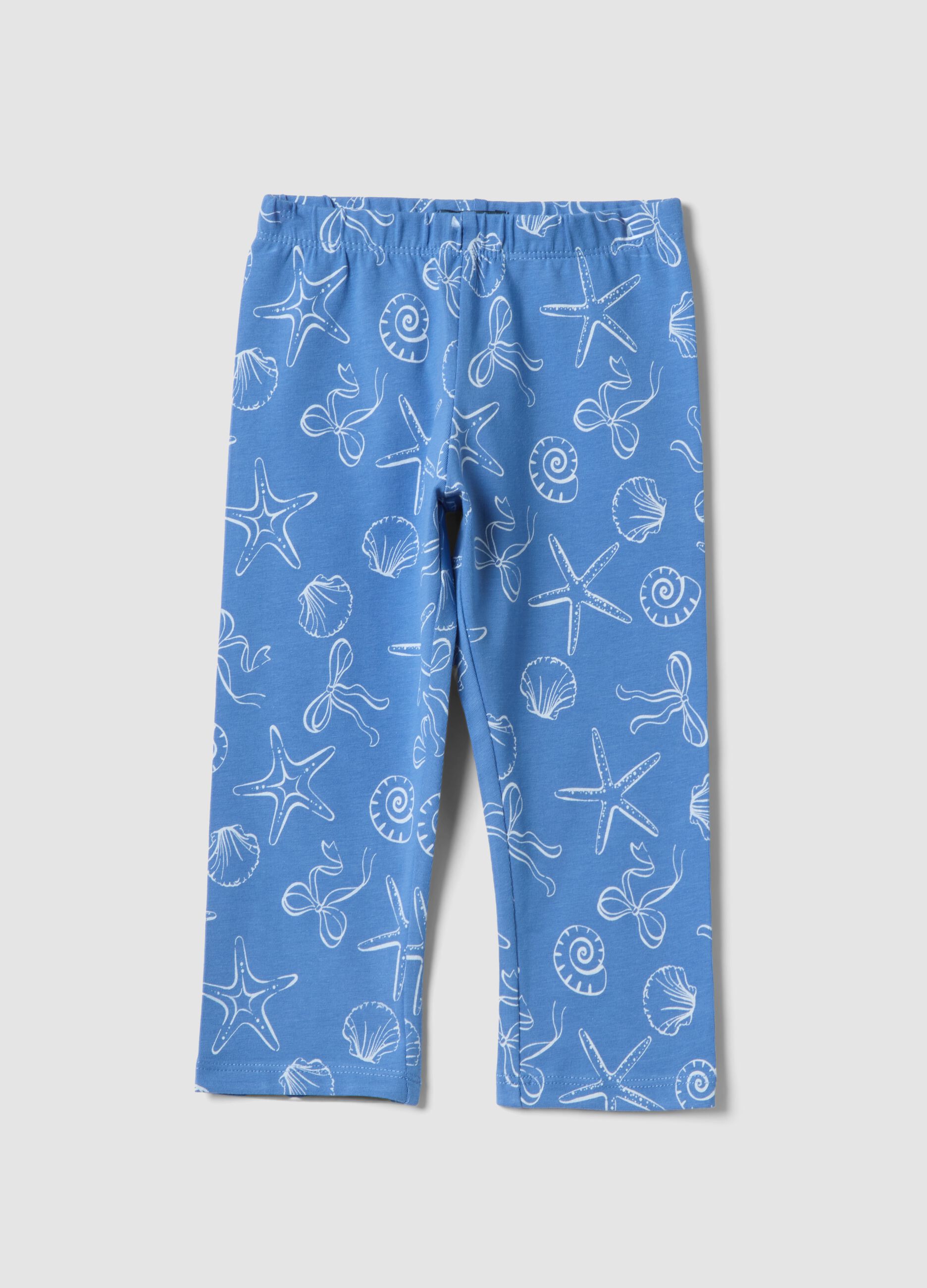 Girls&rsquo; skinny light blue stretch cotton leggings with prints