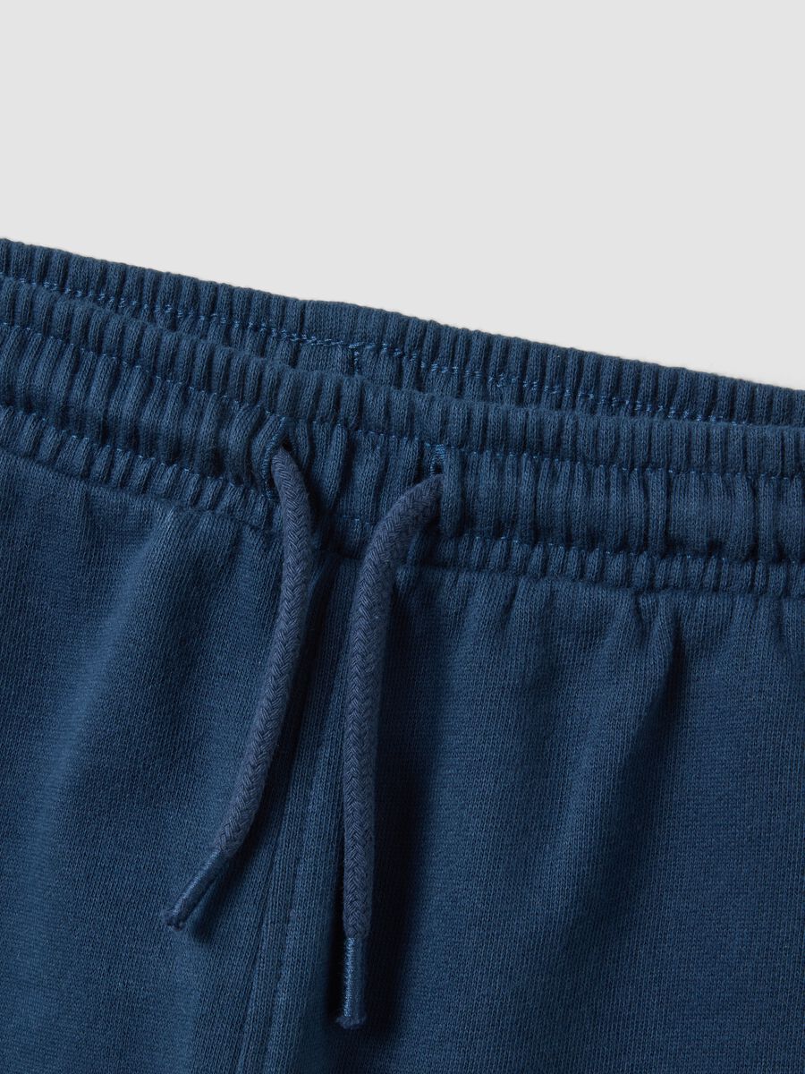Blue organic cotton jogger trousers with drawstring for boys_3