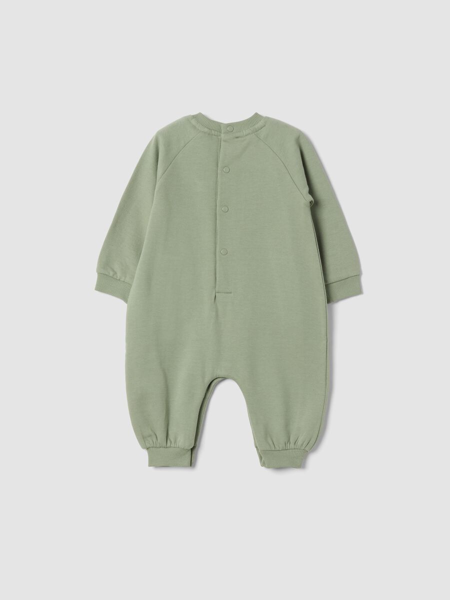 Green organic cotton sleepsuit with Toy Story print_1