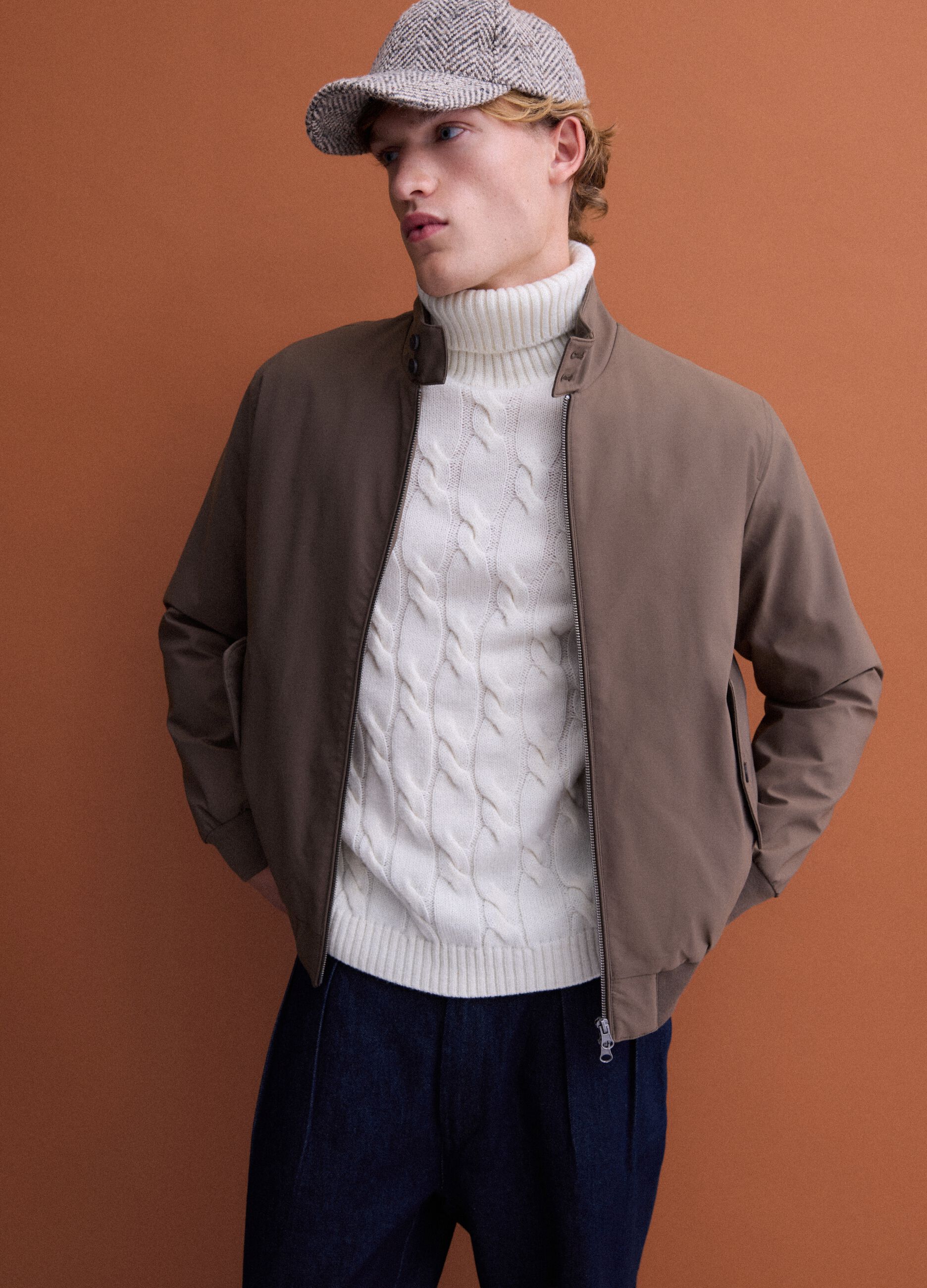 Green padded jacket in a regular fit with zip and high collar