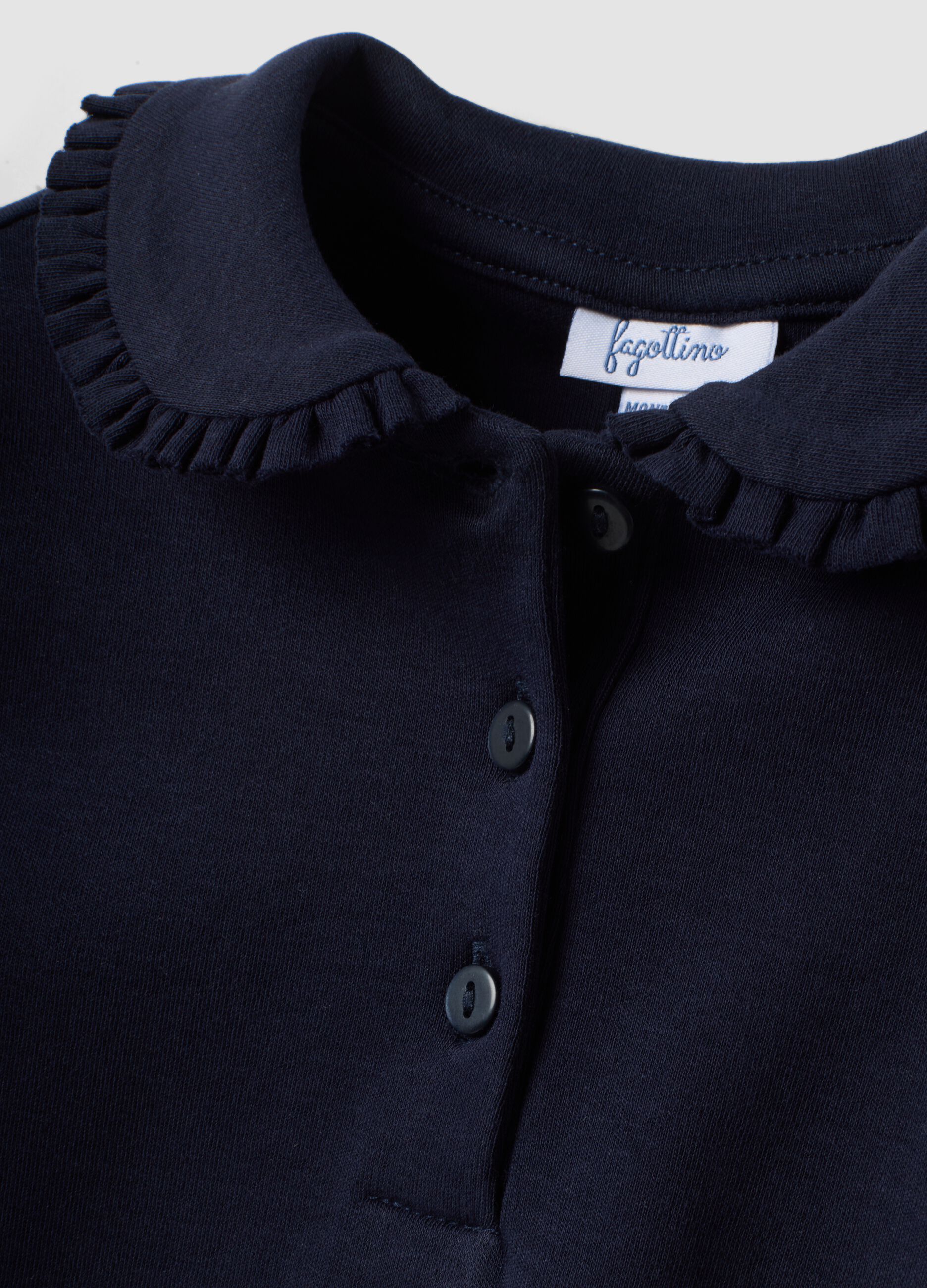 Blue organic cotton polo shirt with ruffled collar