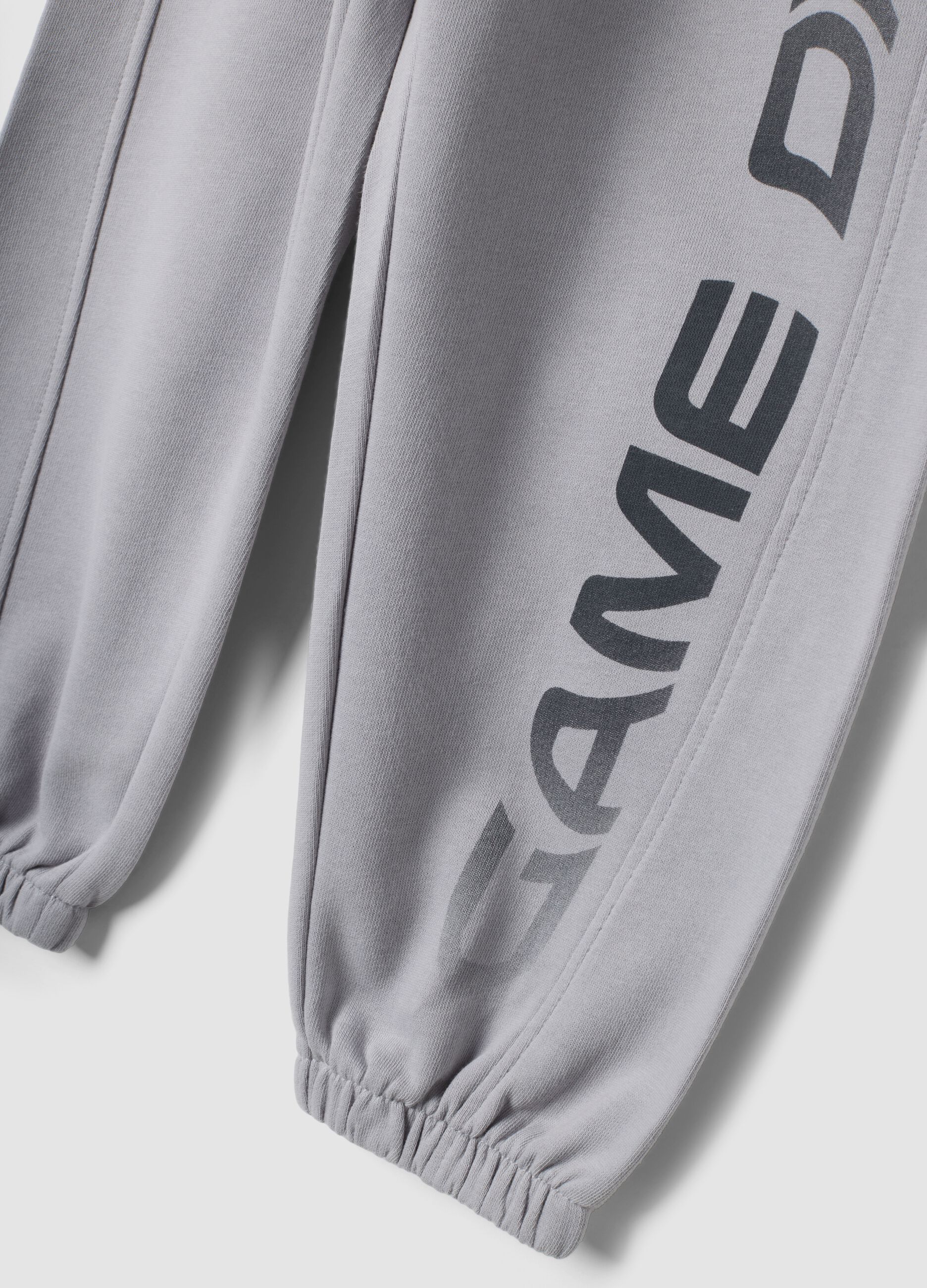 Grey organic cotton jogger trousers with print