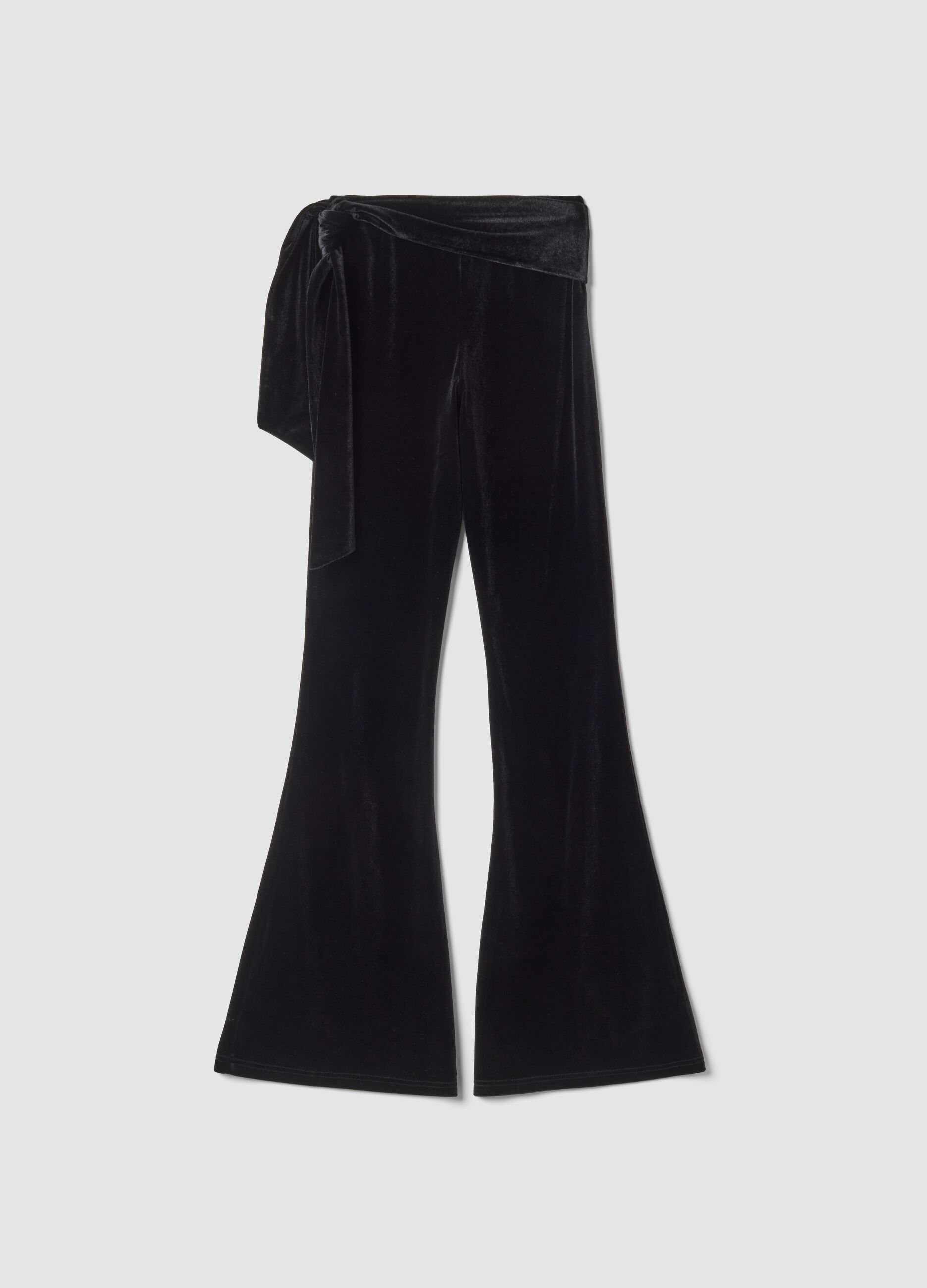 Black velour flare trousers in stretch fabric with side bow detail