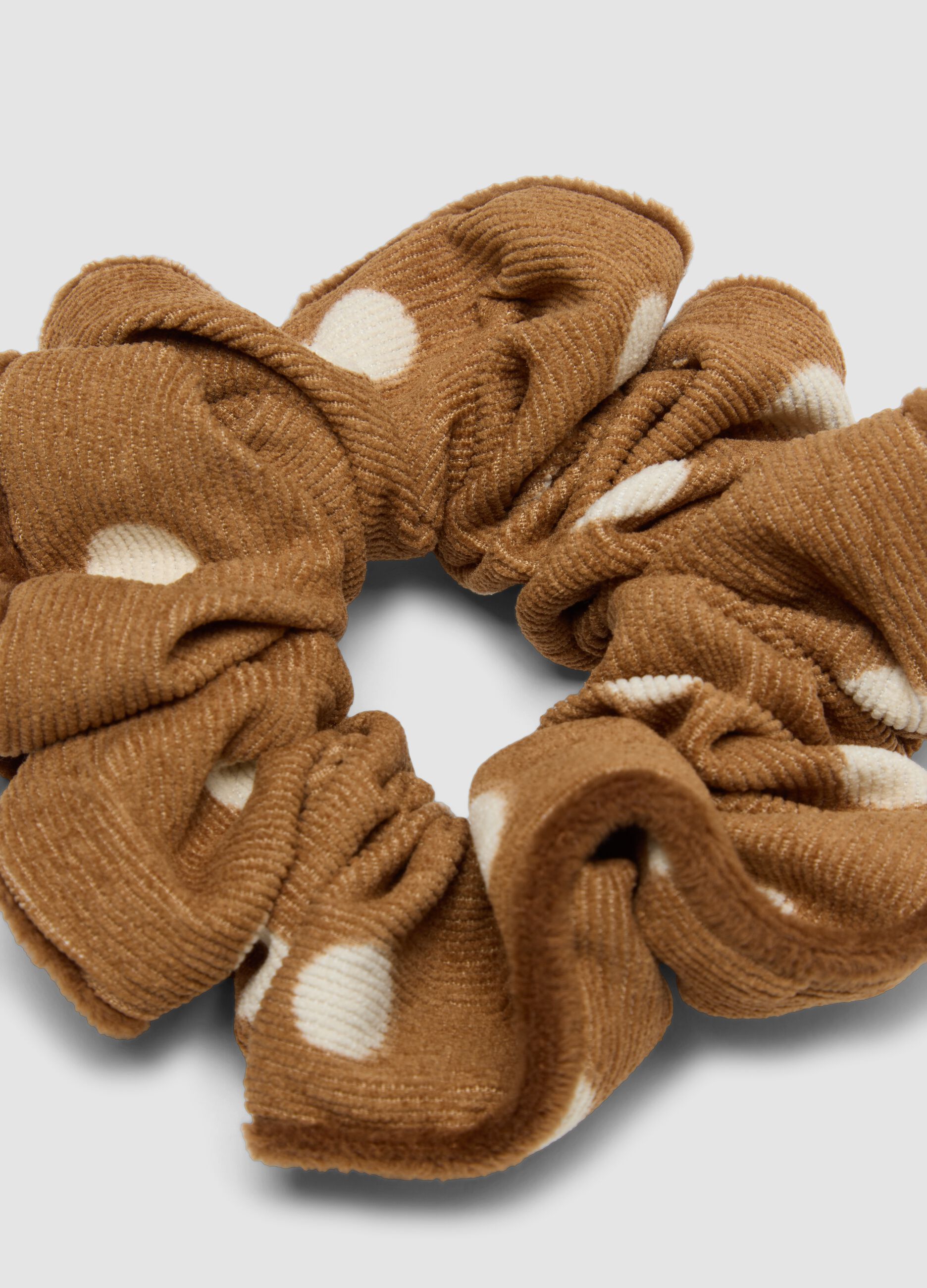 Brown polka-dot scrunchie