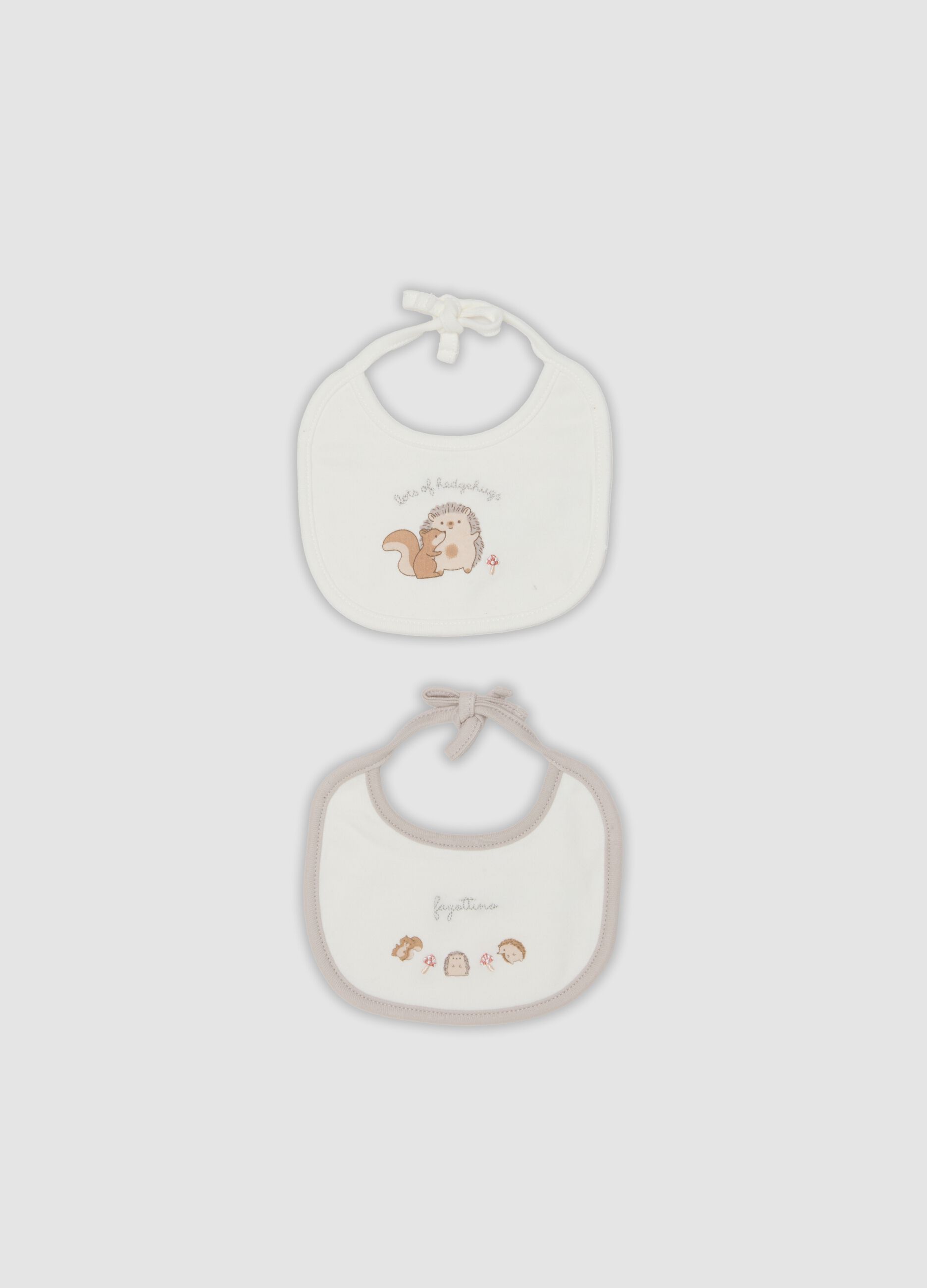 2-pack white organic cotton baby bibs with animal print