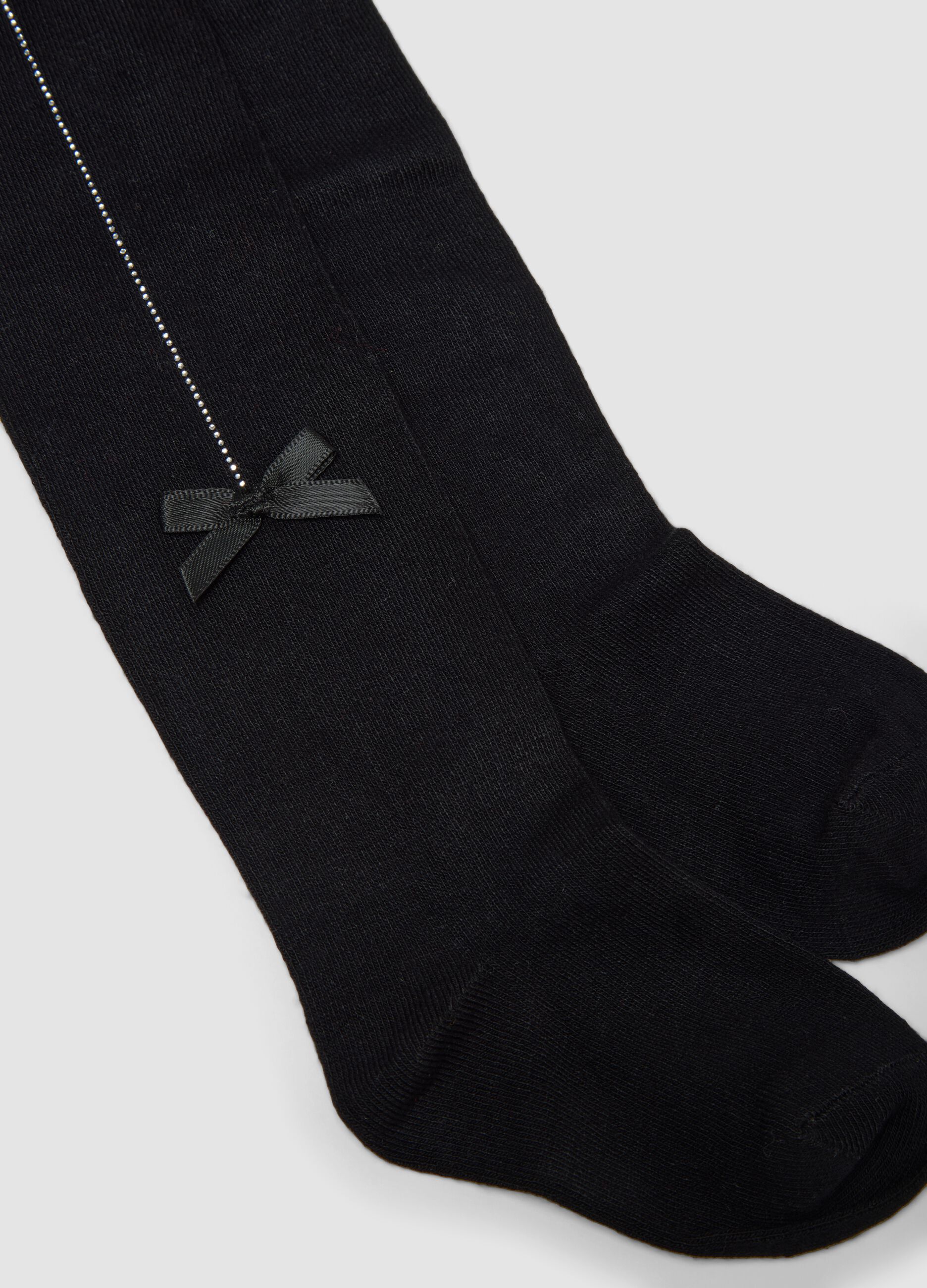 Collant neri in tessuto elasticizzato con fiocchetto