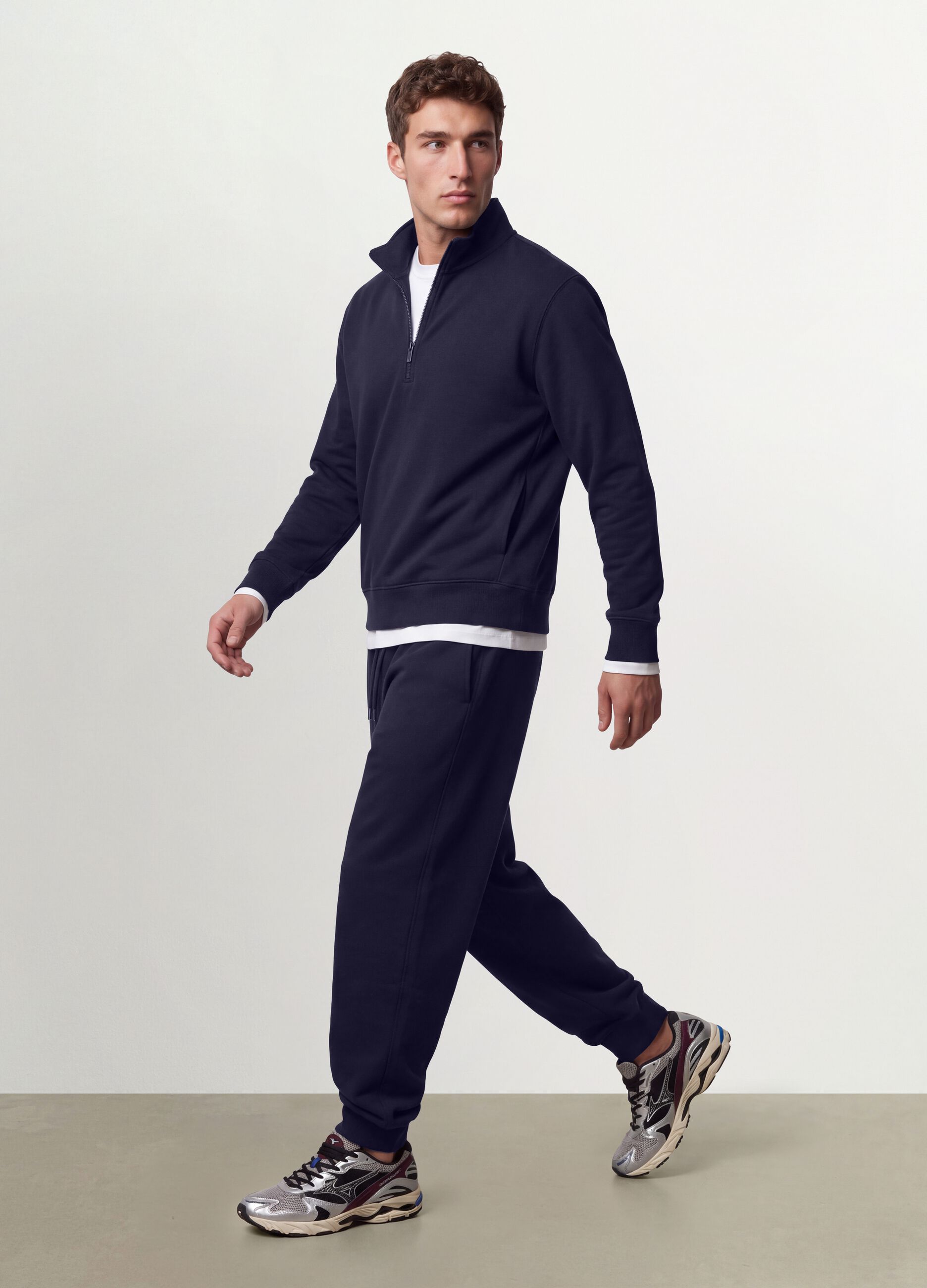 Blue cotton-blend joggers with cuffed hem and drawstring