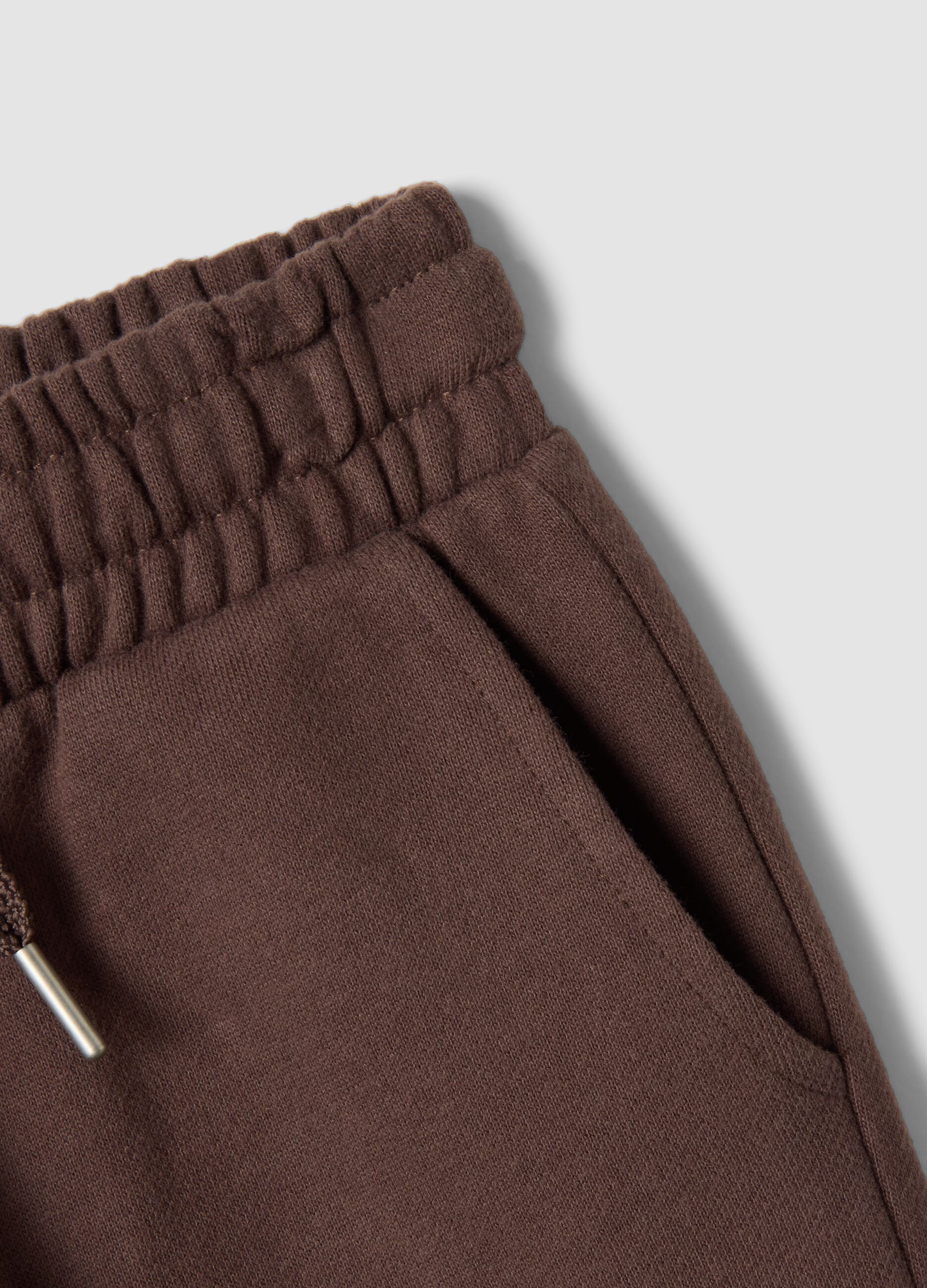 Brown trousers in pure organic cotton