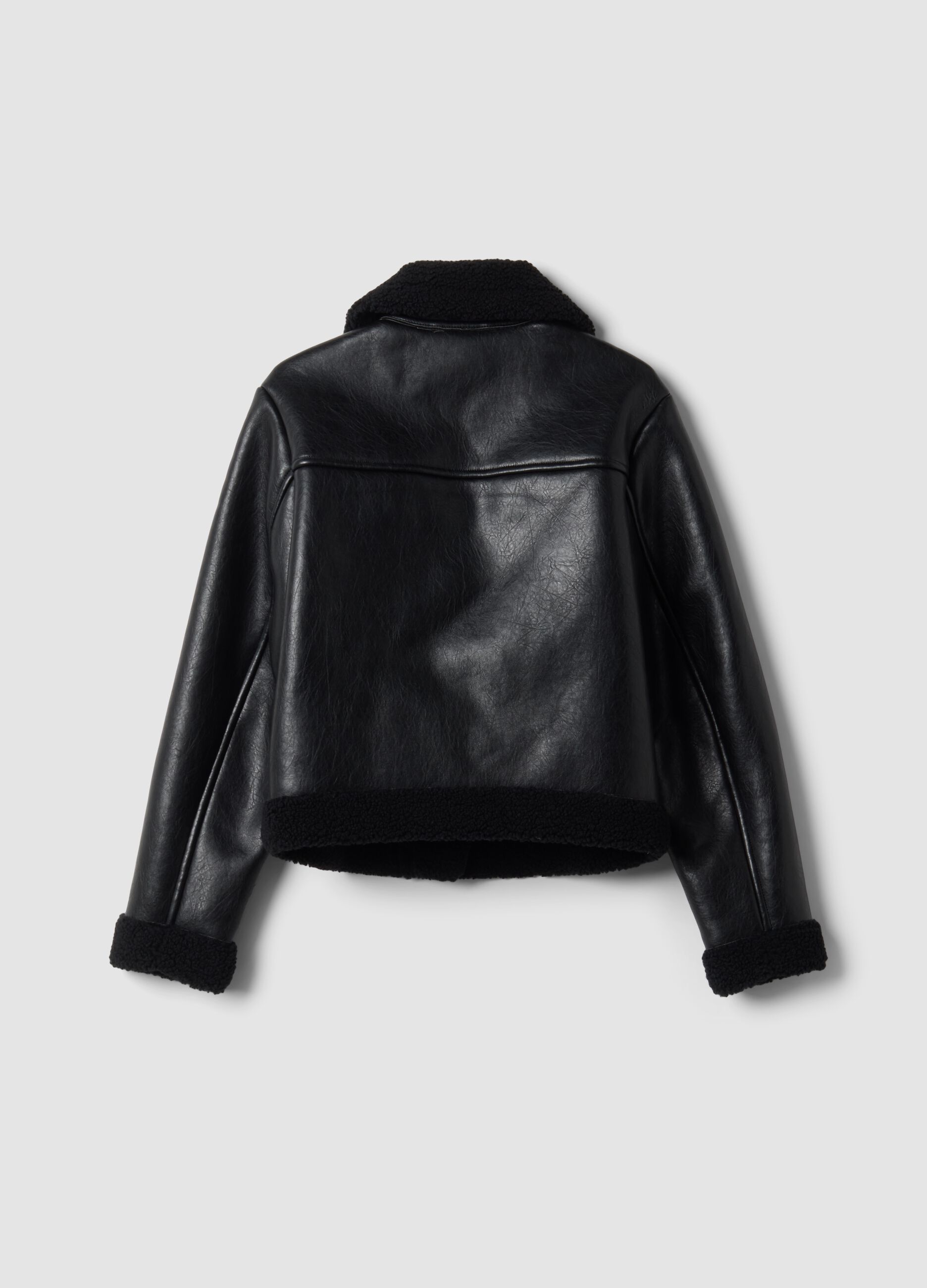 Black aviator-style jacket with diagonal zip