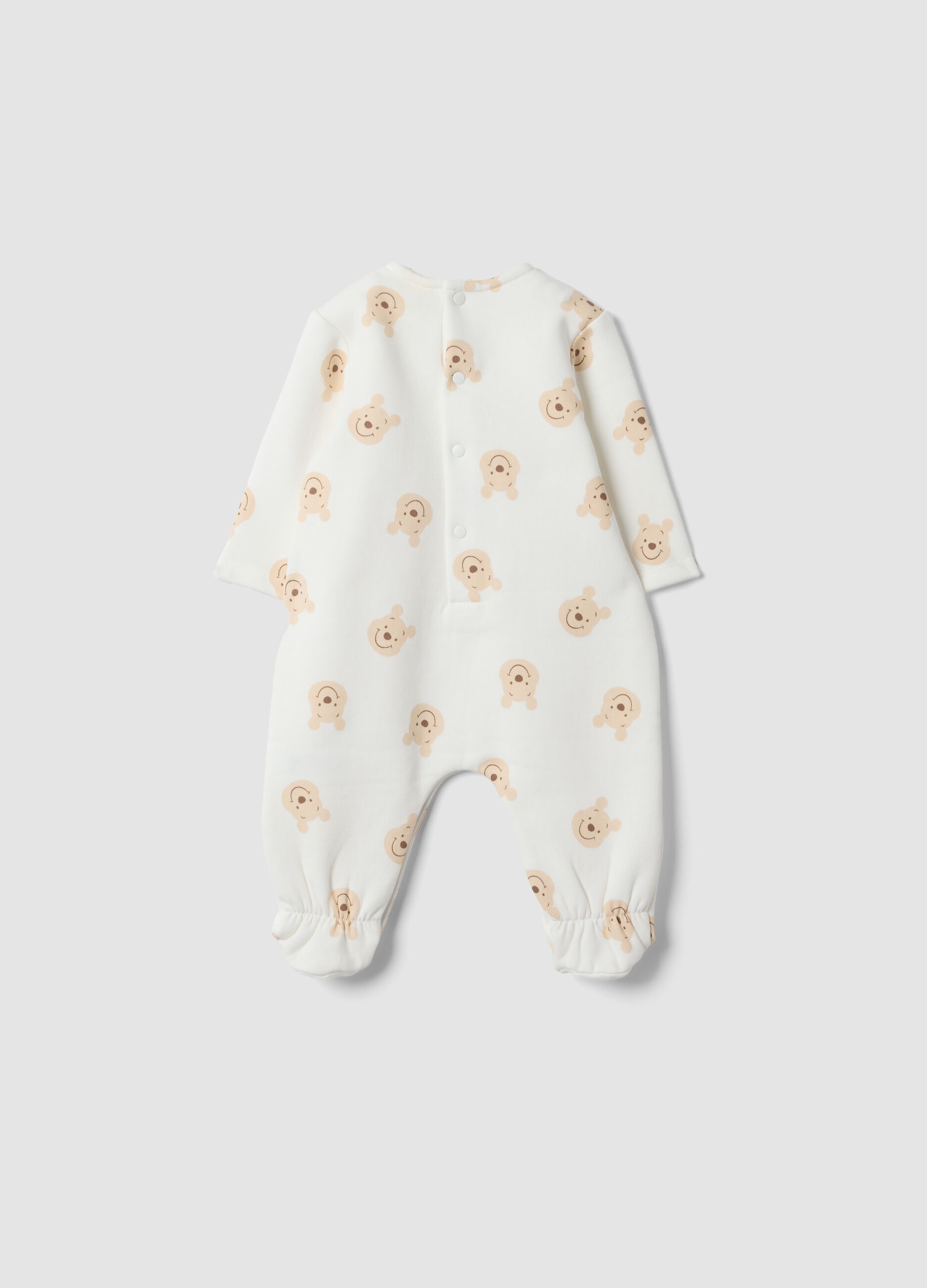 White organic cotton sleepsuit with Winnie the Pooh print
