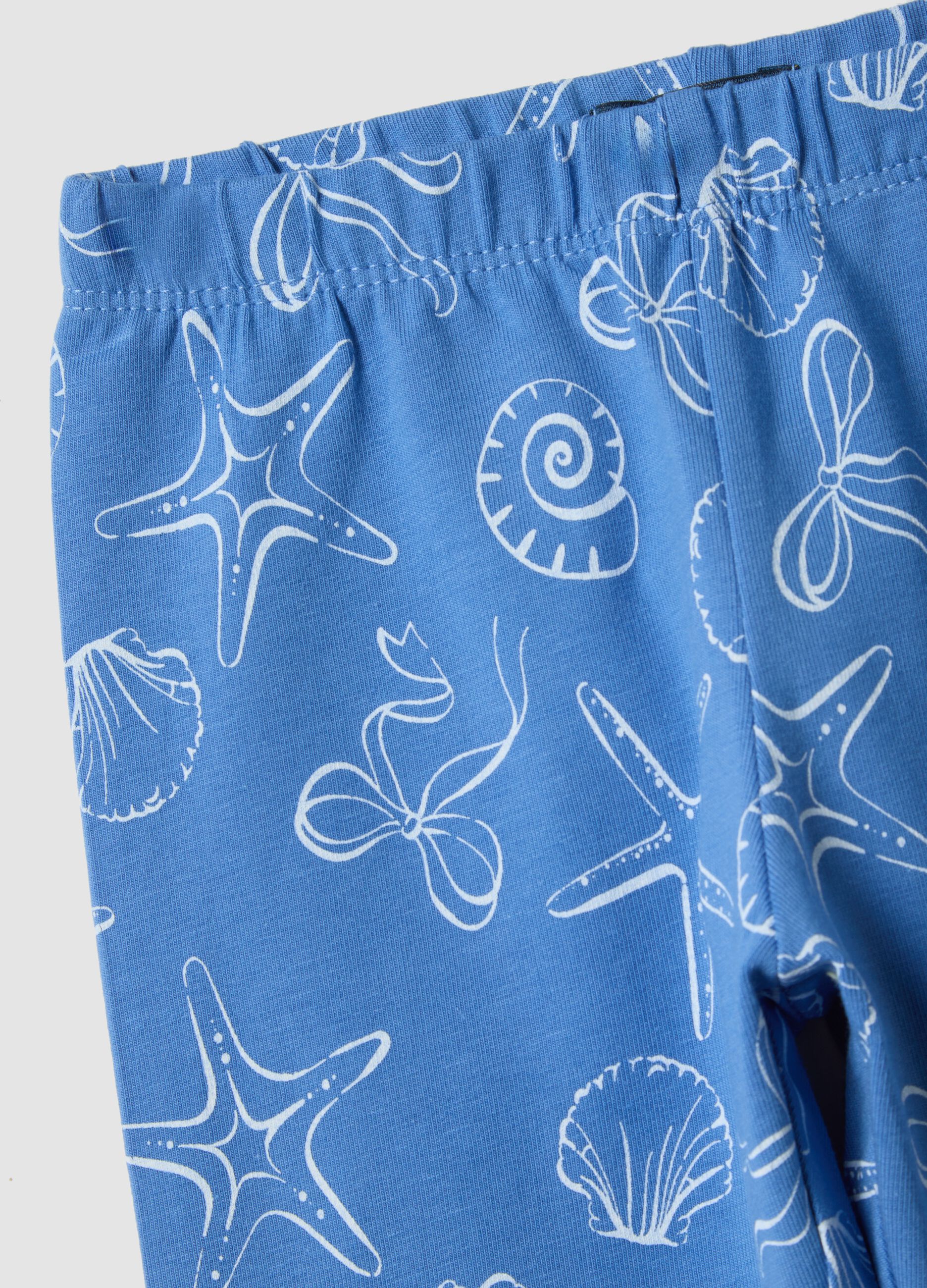 Girls&rsquo; skinny light blue stretch cotton leggings with prints