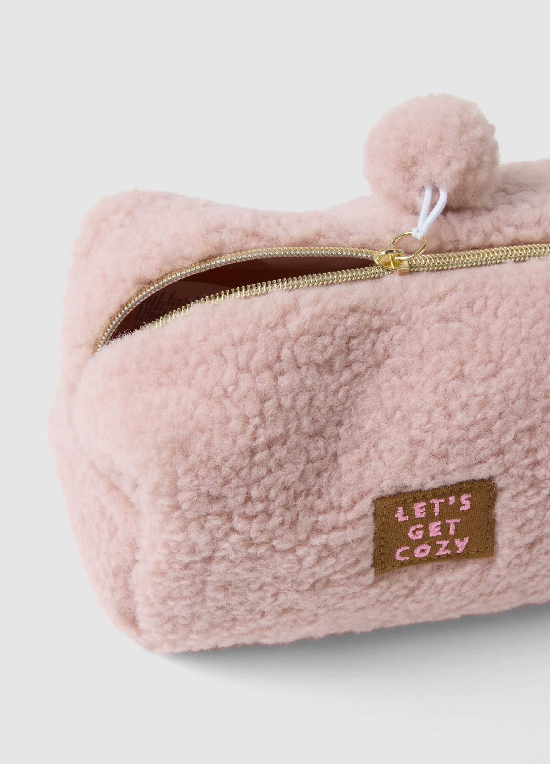 Pink makeup bag with pompom