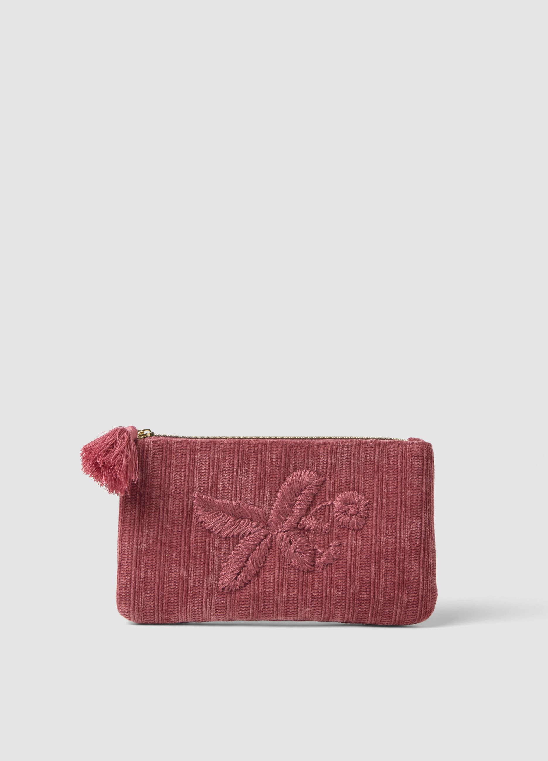 Pink clutch bag with floral embroidery and tassel