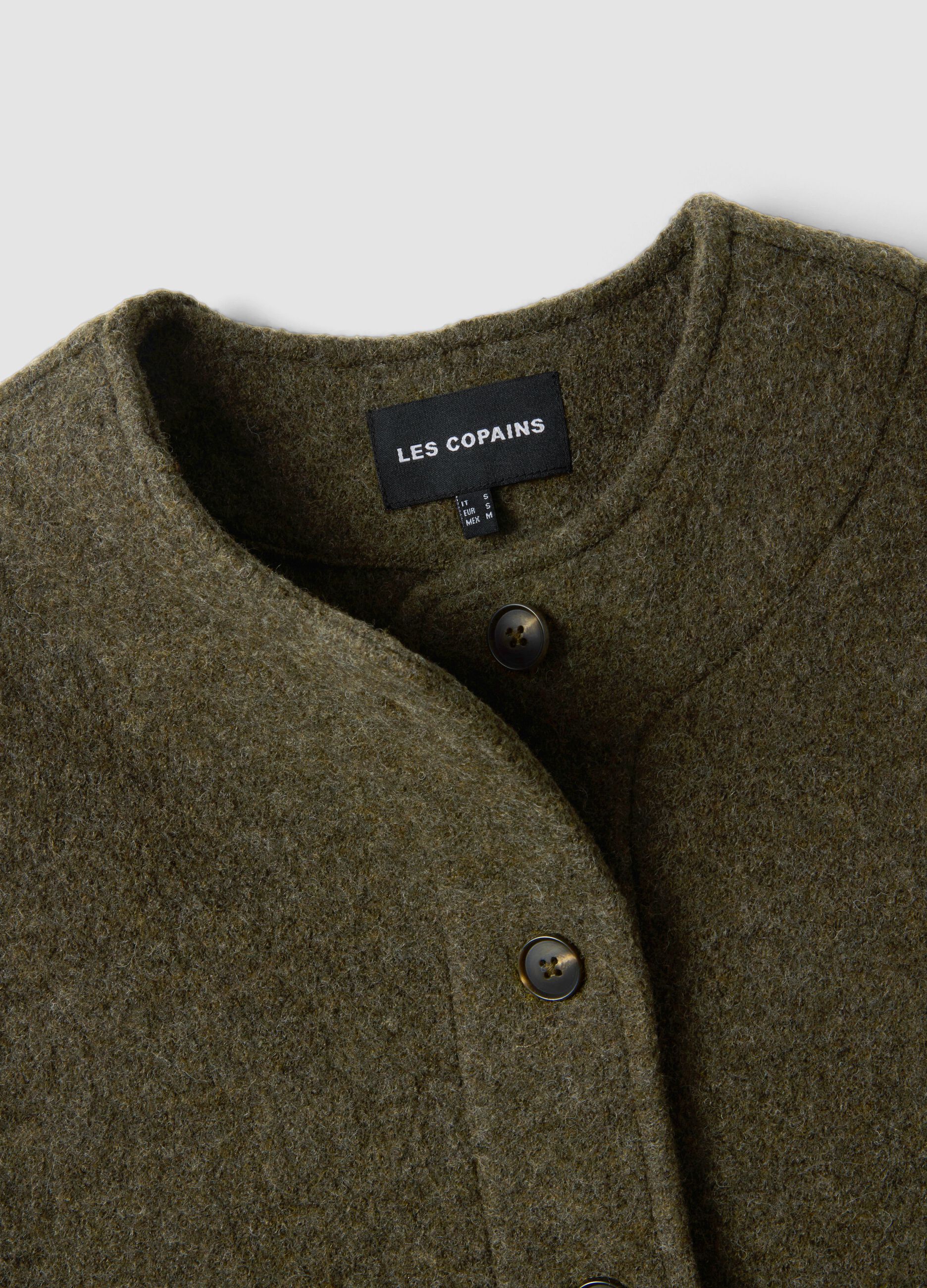 Green pure wool crew-neck gilet with oversized fit