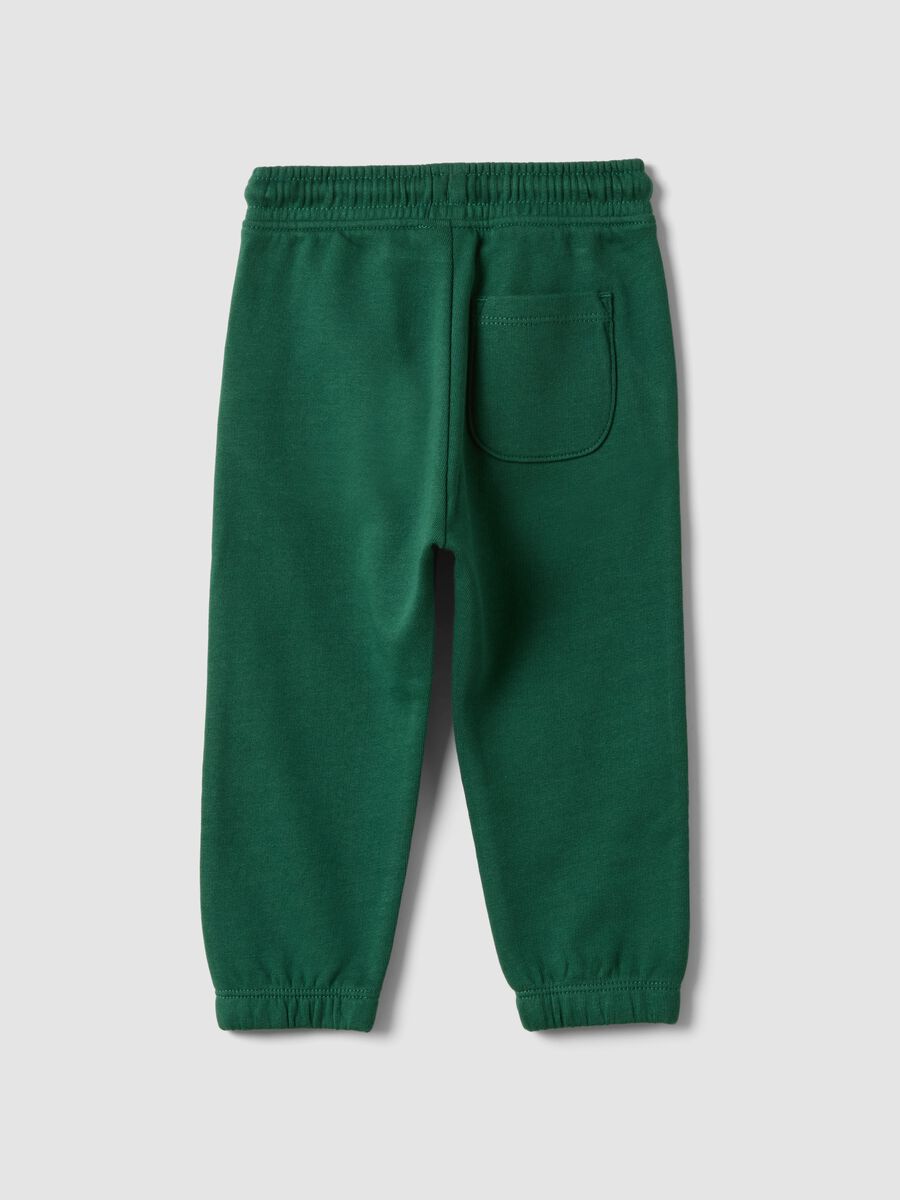 Green organic cotton joggers with drawstring for baby boy_1