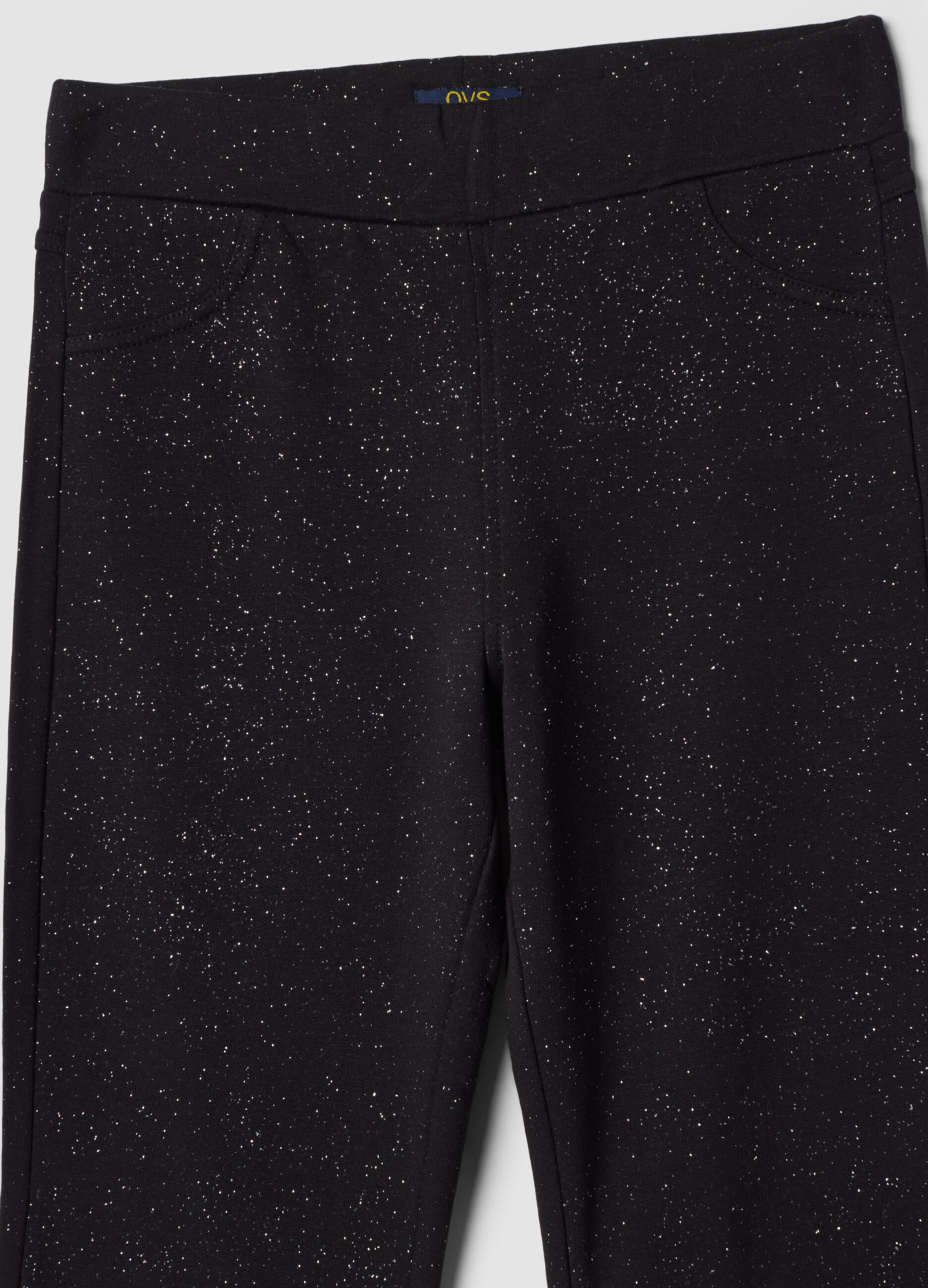 Black flared stretch-cotton trousers with glitter print