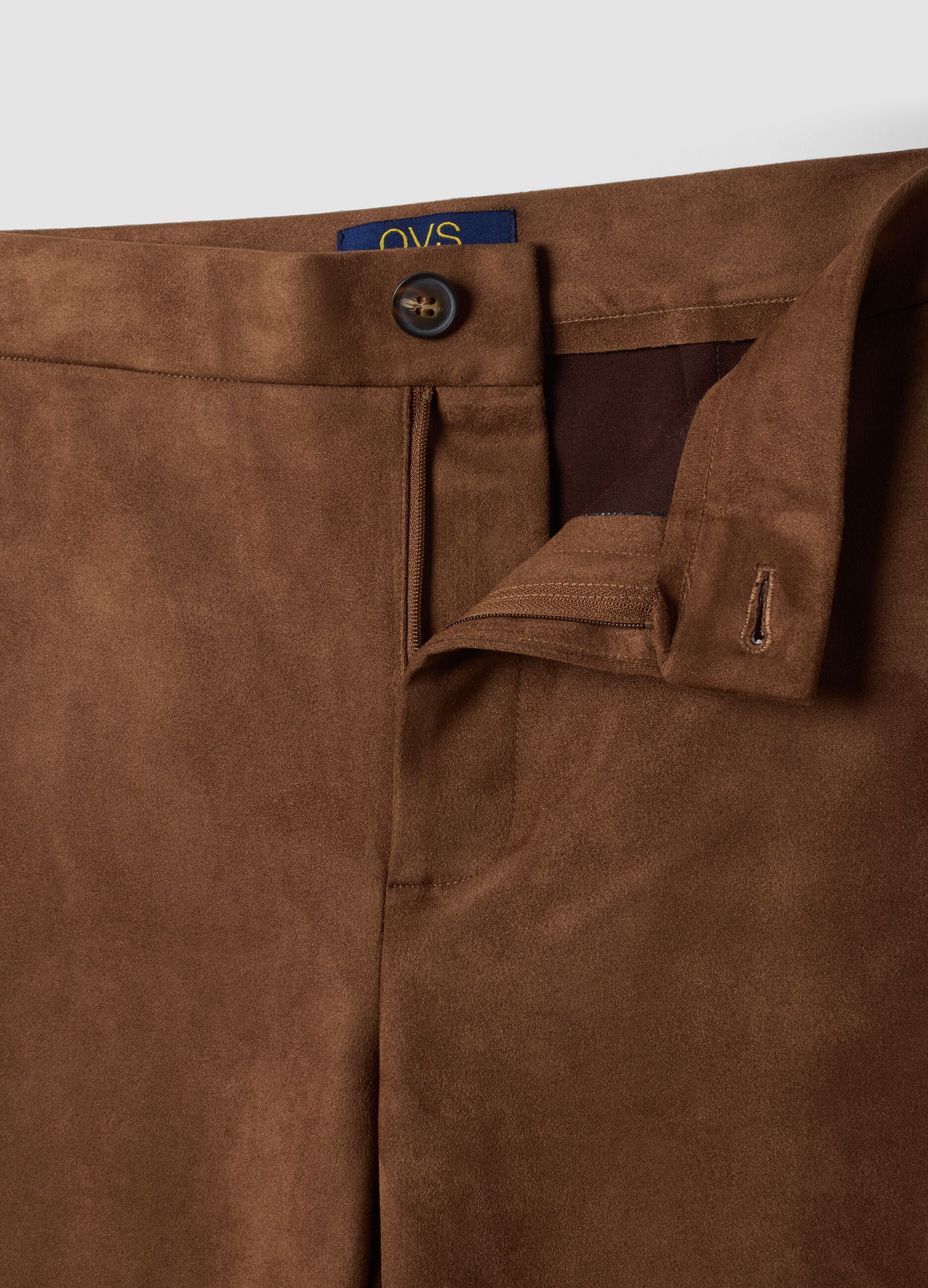 Pantaloni marroni flare in tessuto elasticizzato