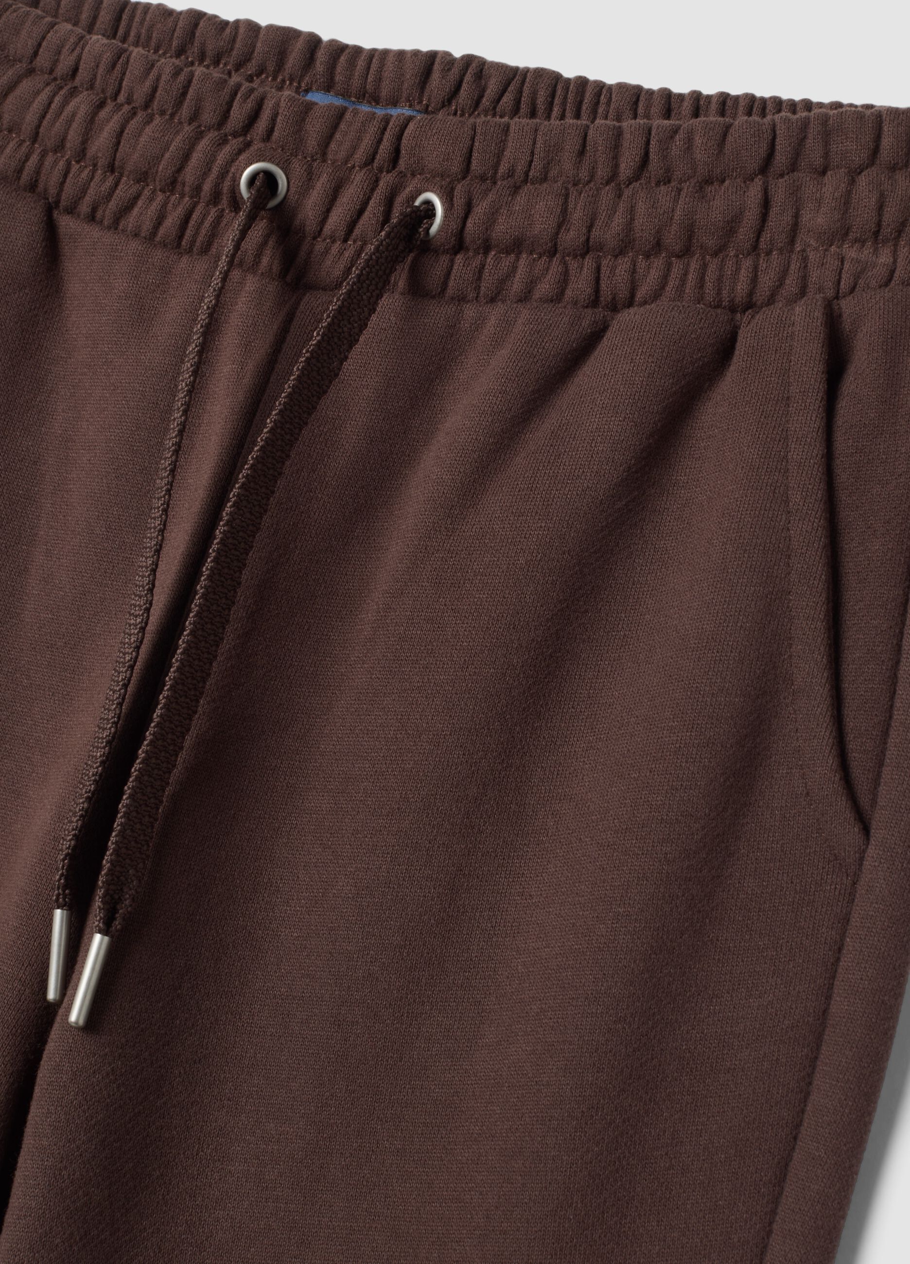 Pantaloni marroni flare in puro cotone organico