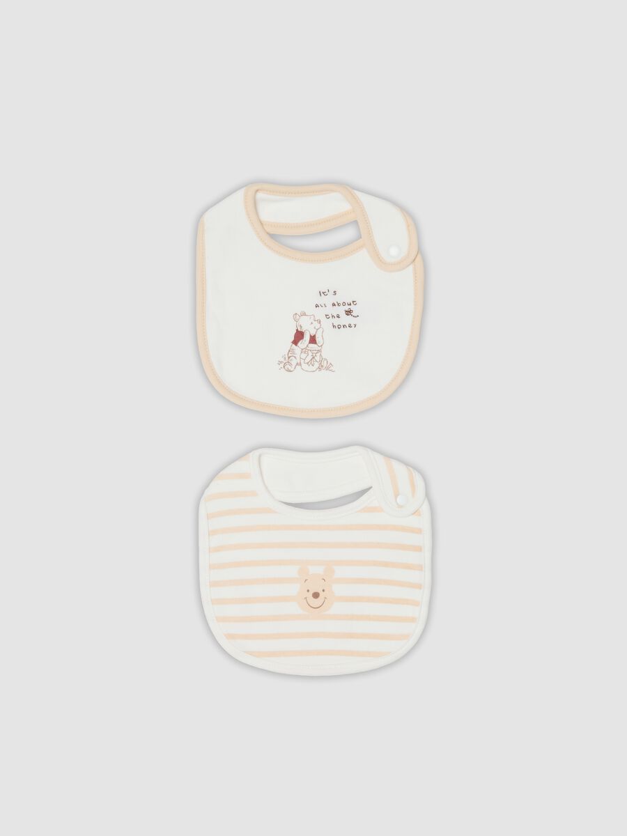 2-pack of white organic cotton Winnie the Pooh bibs_0