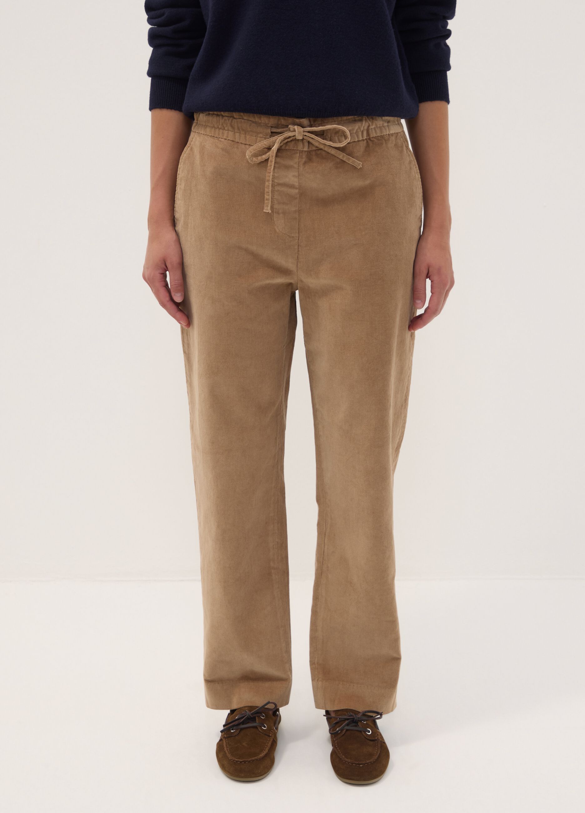Beige ribbed stretch cotton trousers with elasticated waistband