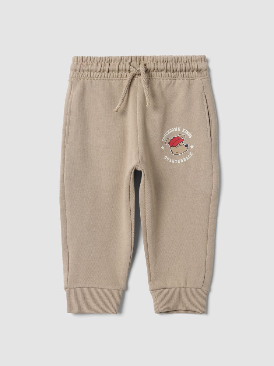 Beige pure cotton joggers with puppy print for baby boy_0
