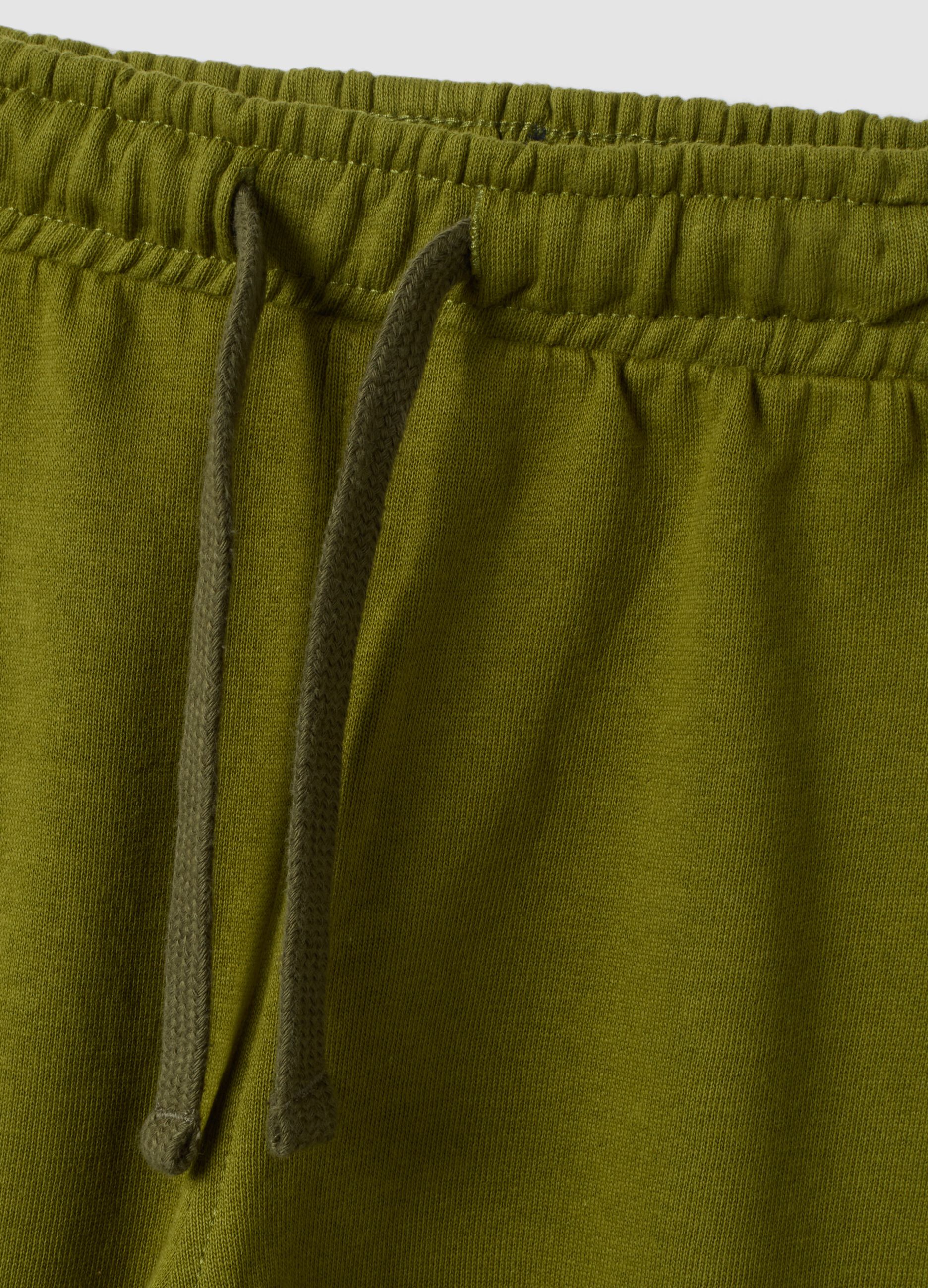Tuta verde in puro cotone con felpa girocollo