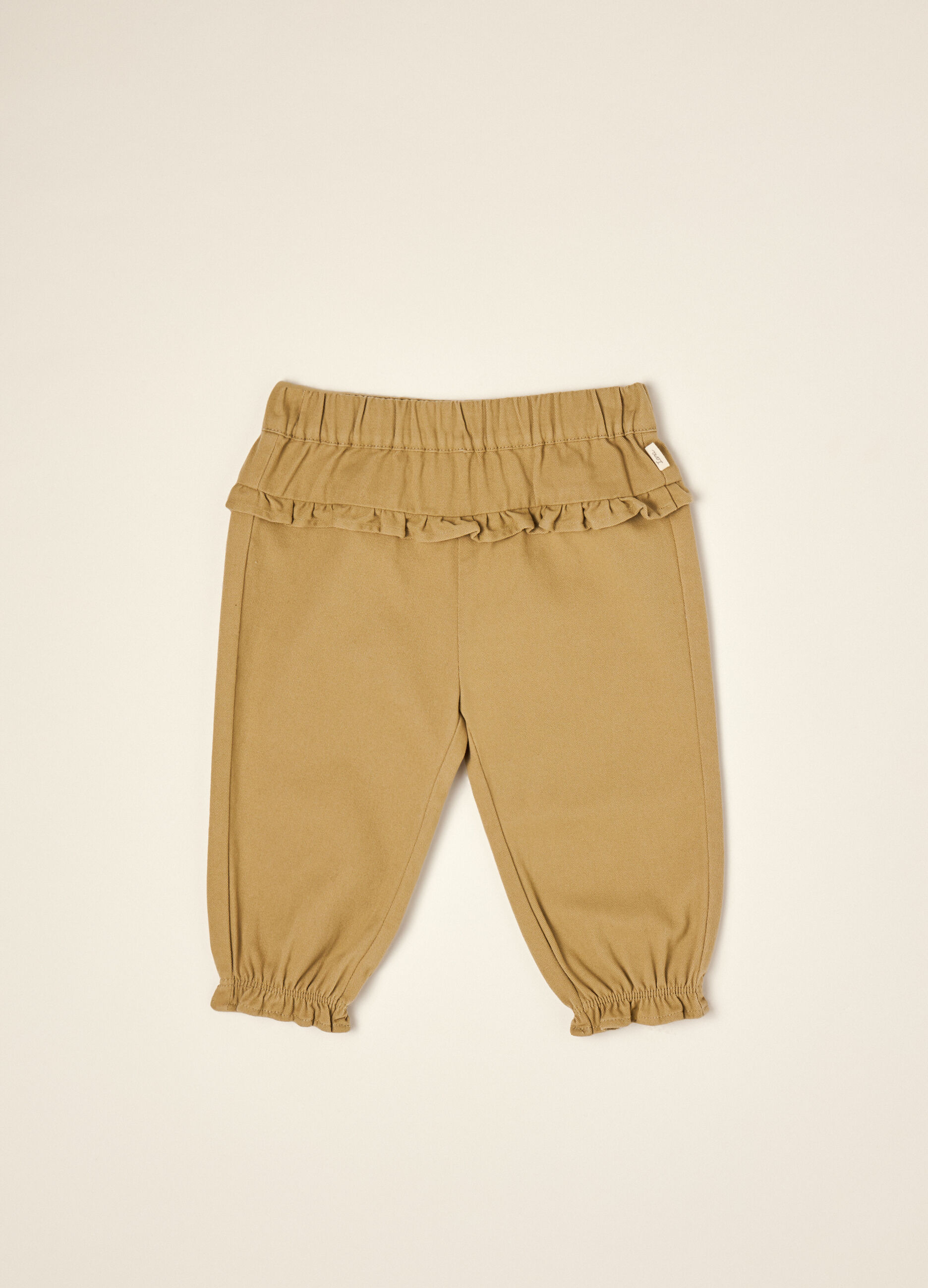 Beige pure cotton trousers with ruffle detail