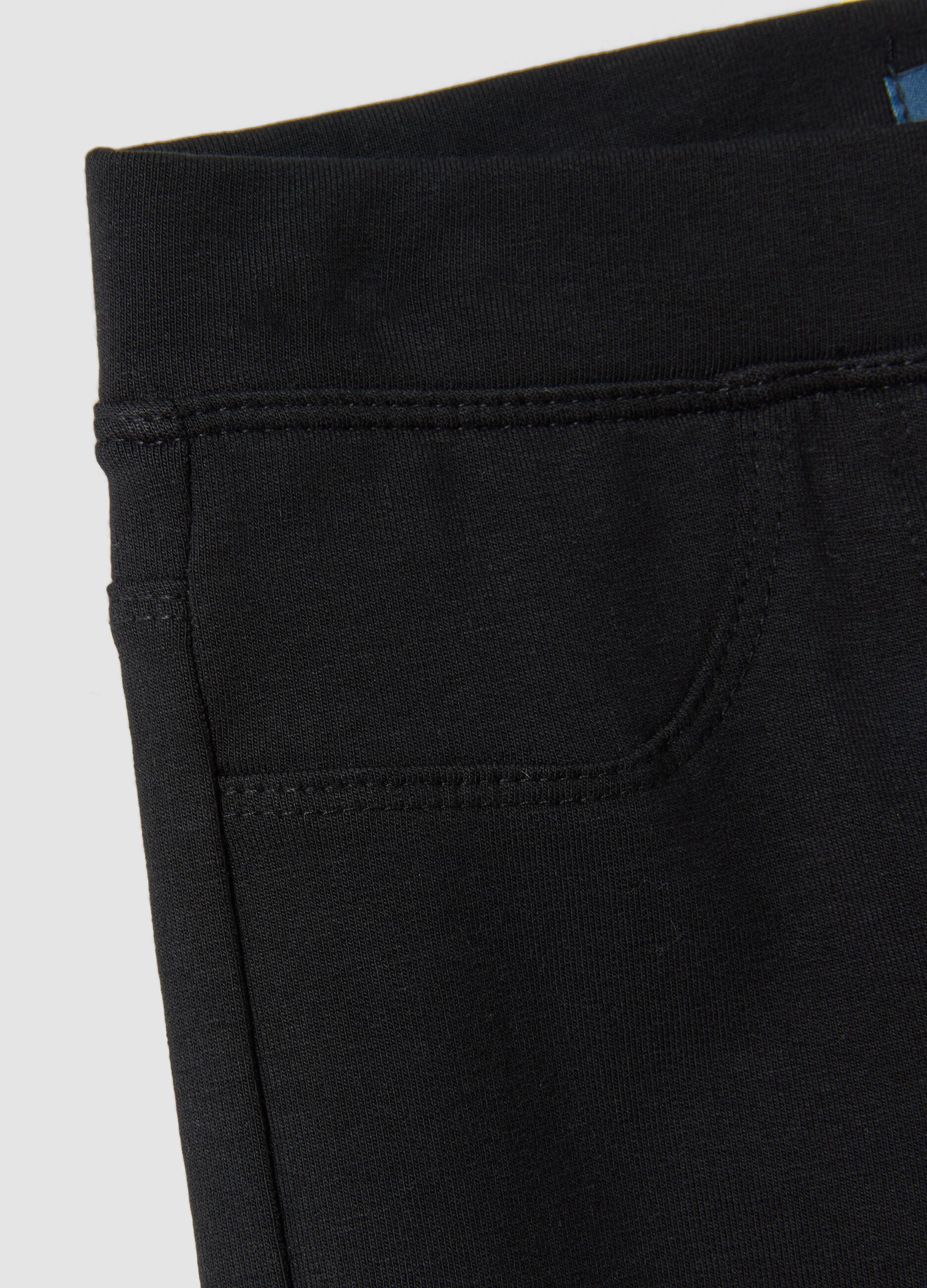 بنطال treggings أسود بقصّة ضيّقة من قطن عضوي مطاطي للبنات