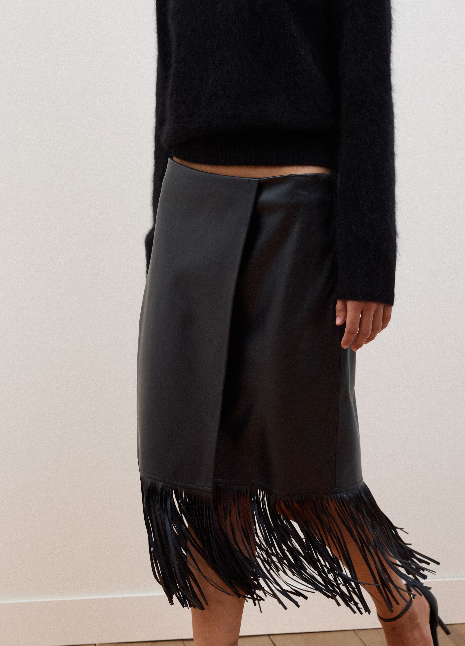 Black midi skirt with fringe hem