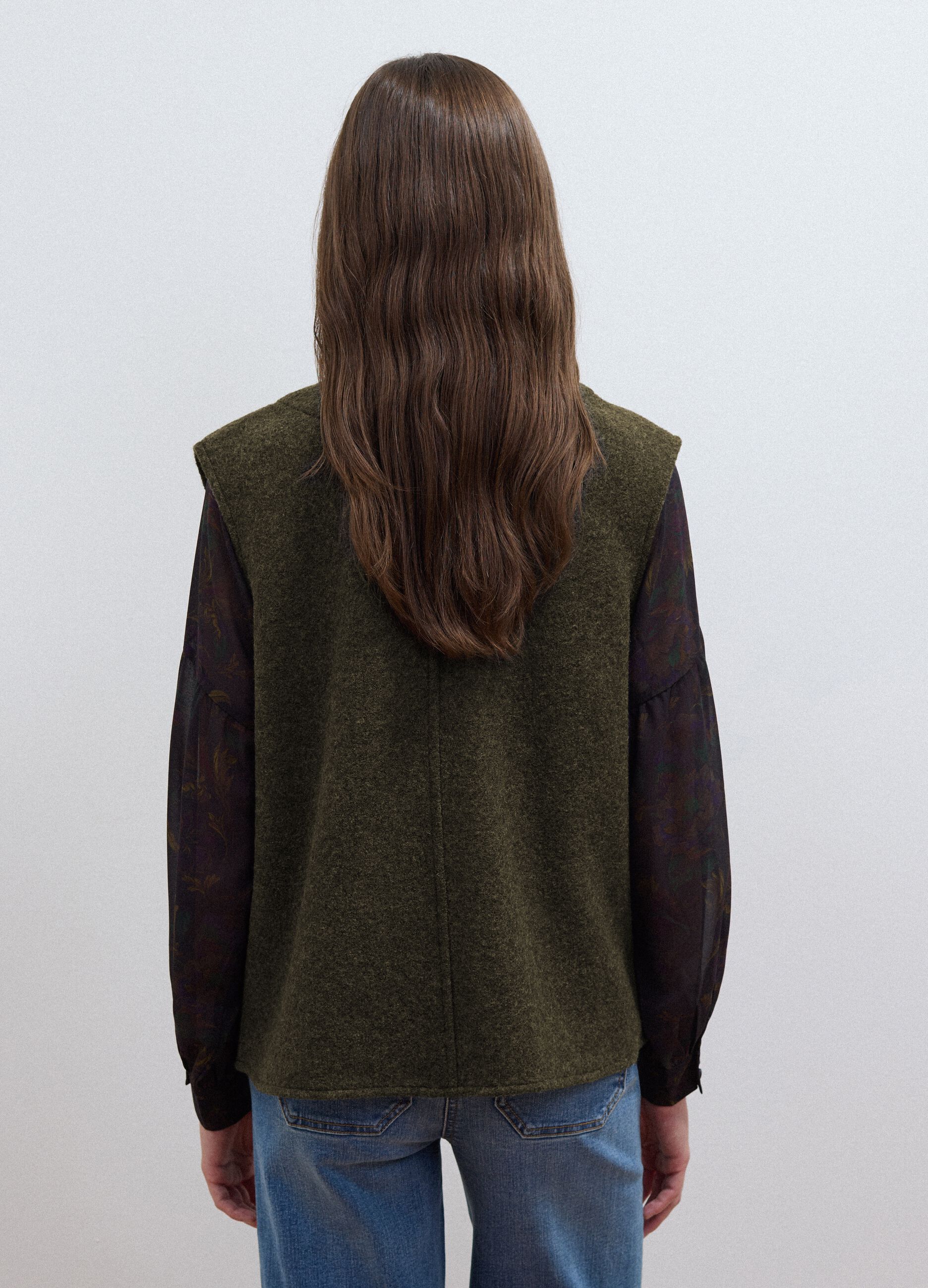 Green pure wool crew-neck gilet with oversized fit