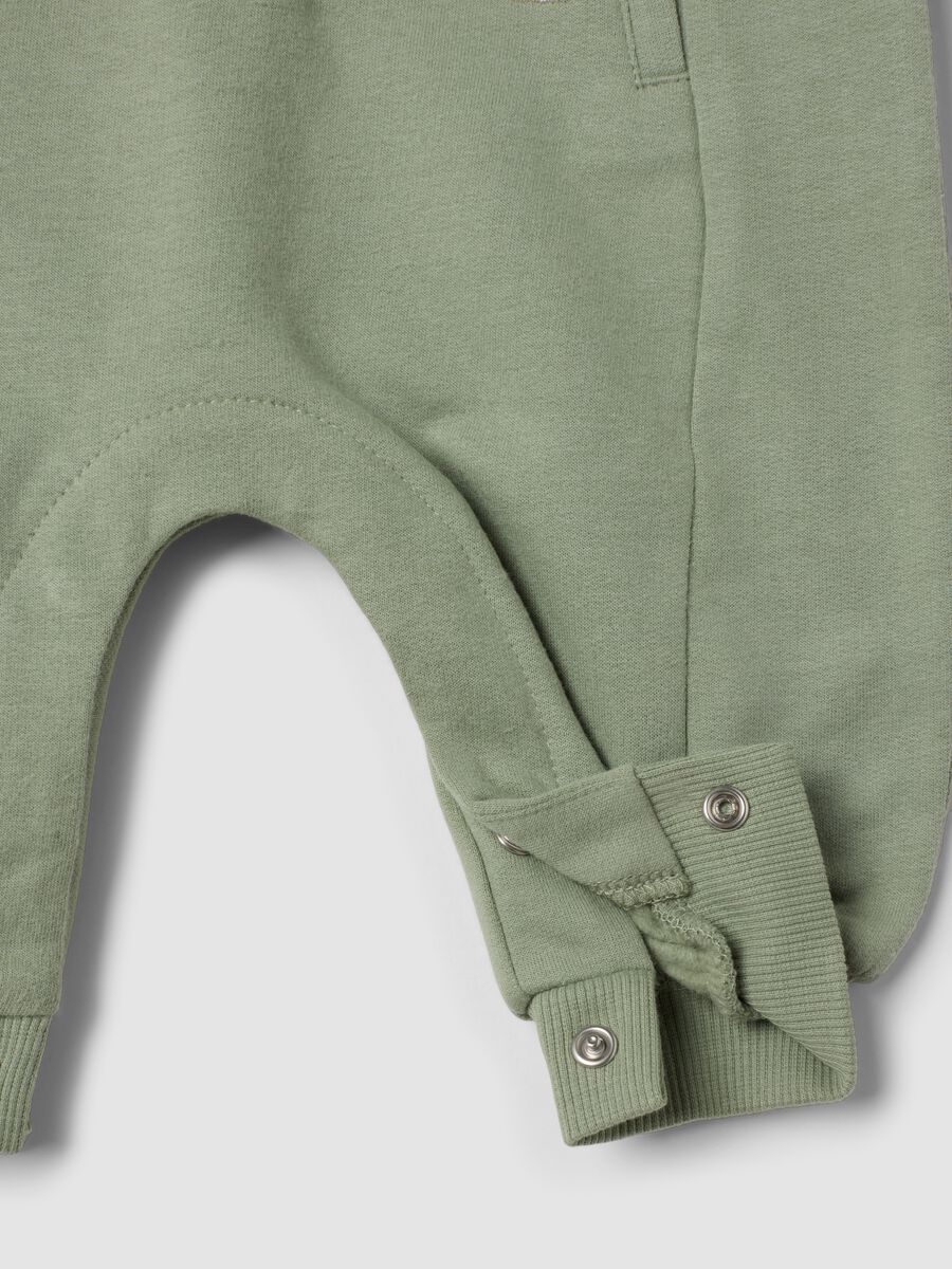 Green organic cotton sleepsuit with Toy Story print_2