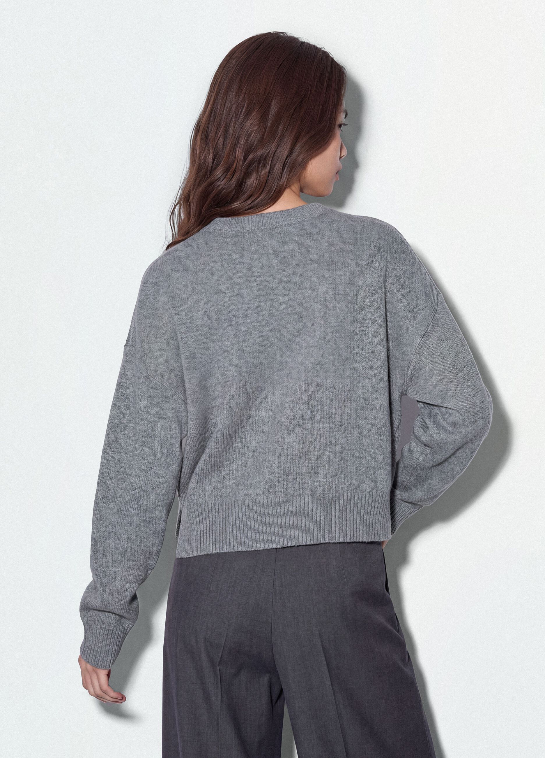 Maglia grigia in tessuto elasticizzato con motivo a stelle over fit