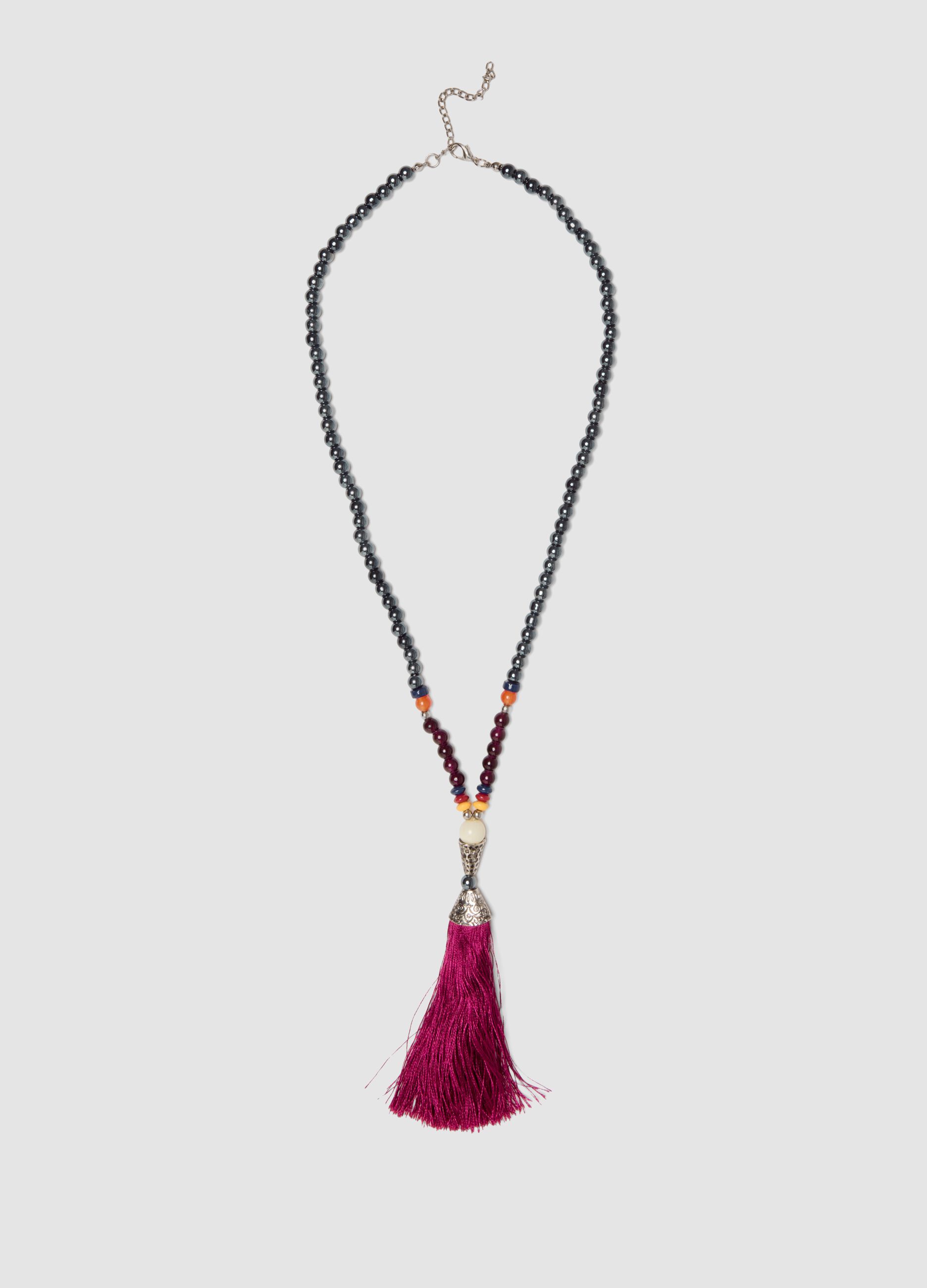 Red necklace with decorative tassel