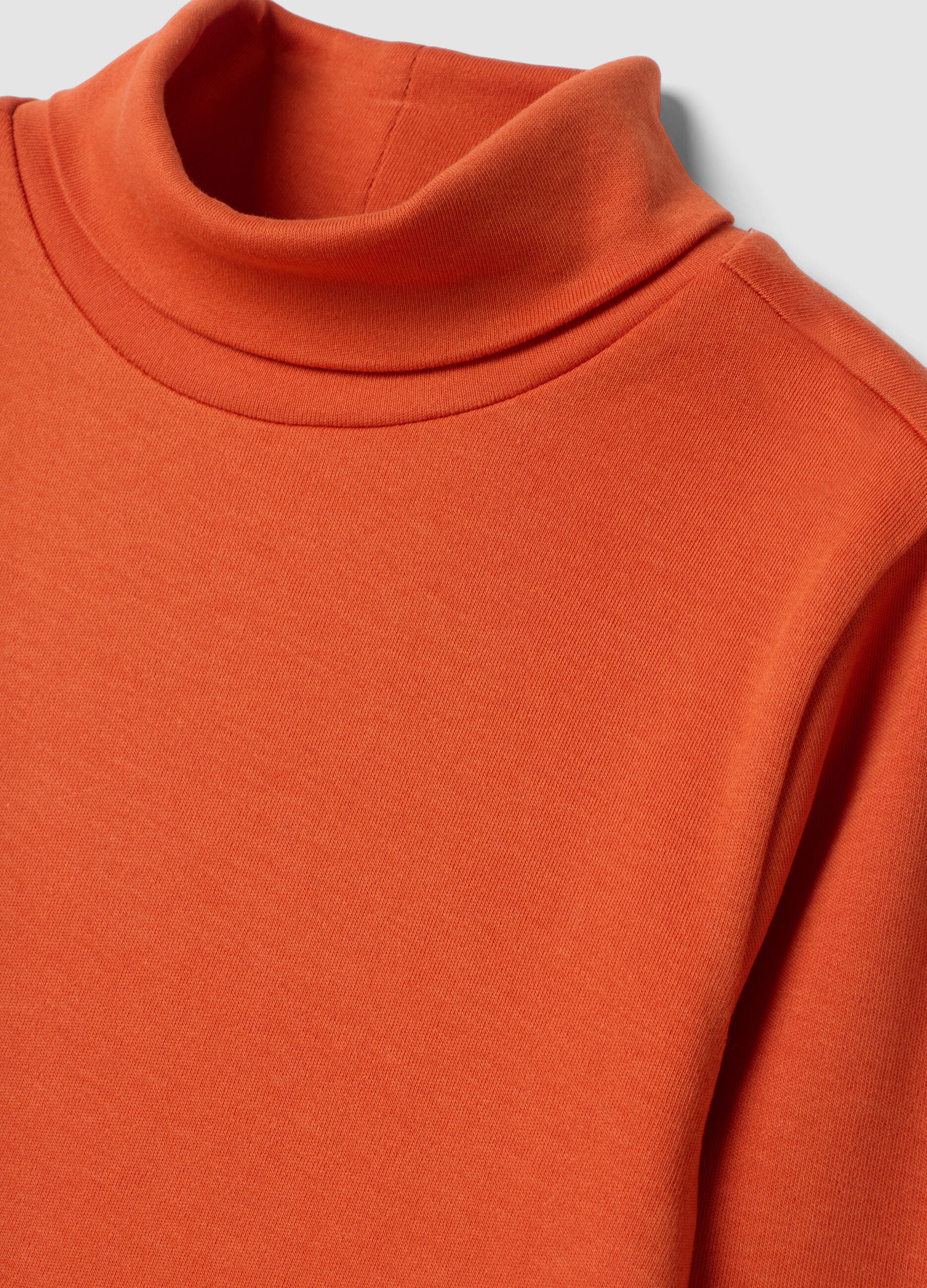 Maglia arancione in puro cotone organico con dolcevita
