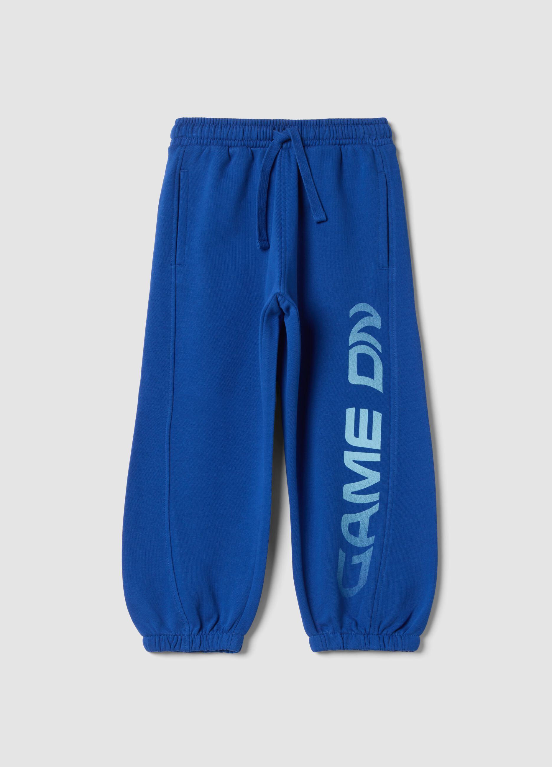 Pantaloni jogger blu in puro cotone organico con stampa