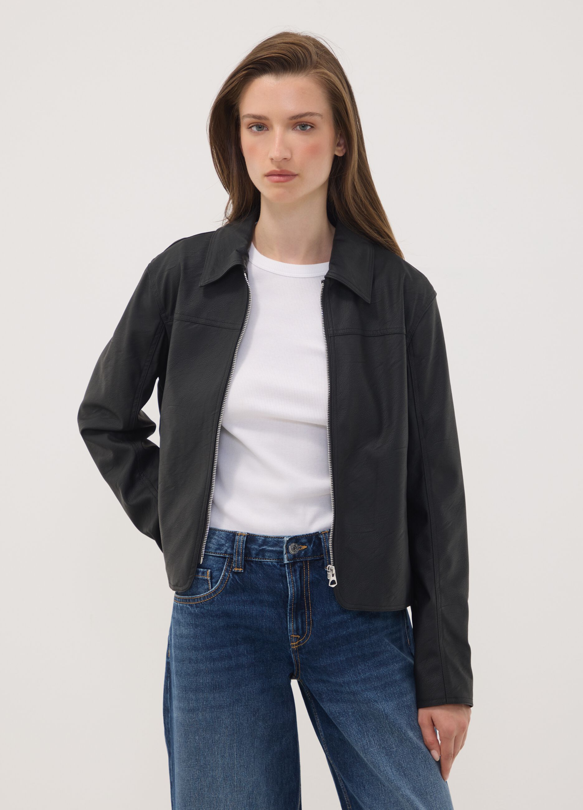 Black zip-up jacket with slim-fit collar