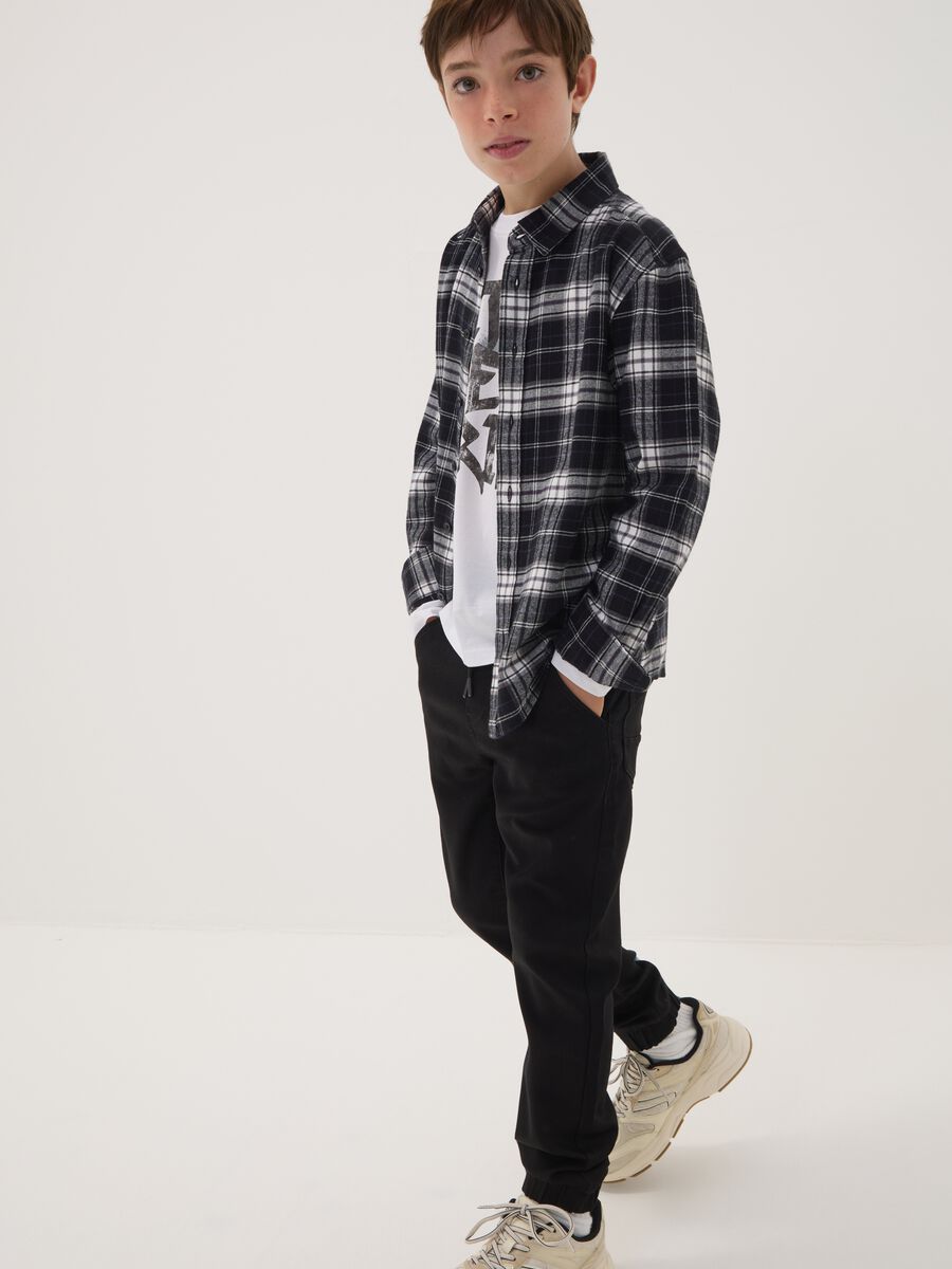Black stretch-cotton denim joggers with elasticated waistband for boys_0