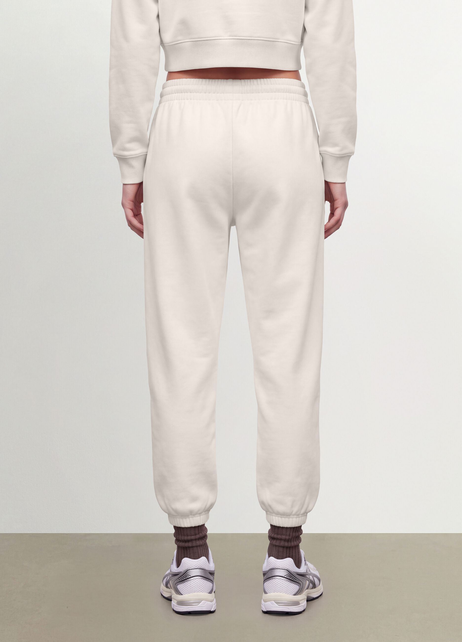 White cotton-blend joggers with elasticated waistband, regular fit