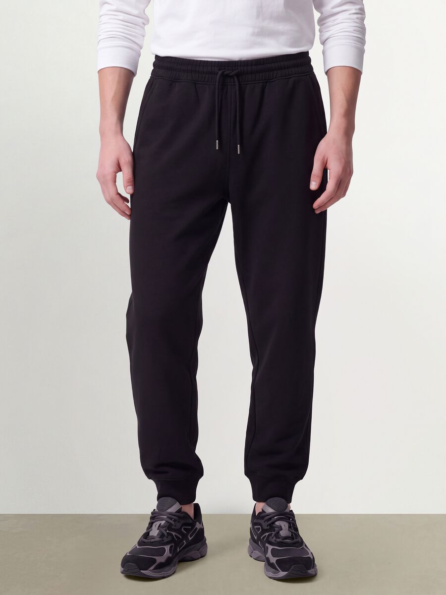 Black cotton-blend joggers with cuffed hems and drawstring waist_1