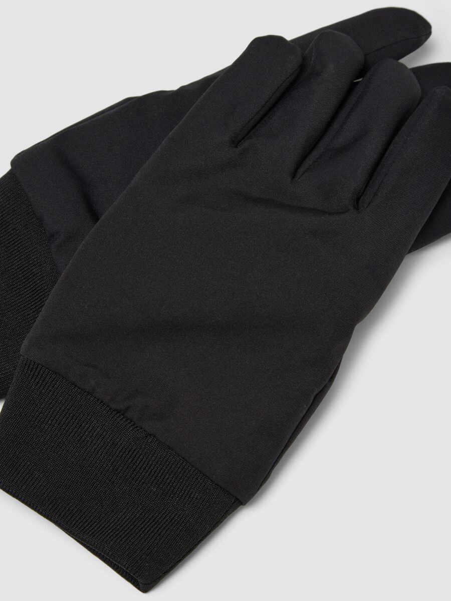 Black gloves with ribbed cuffs and non-slip grips_2